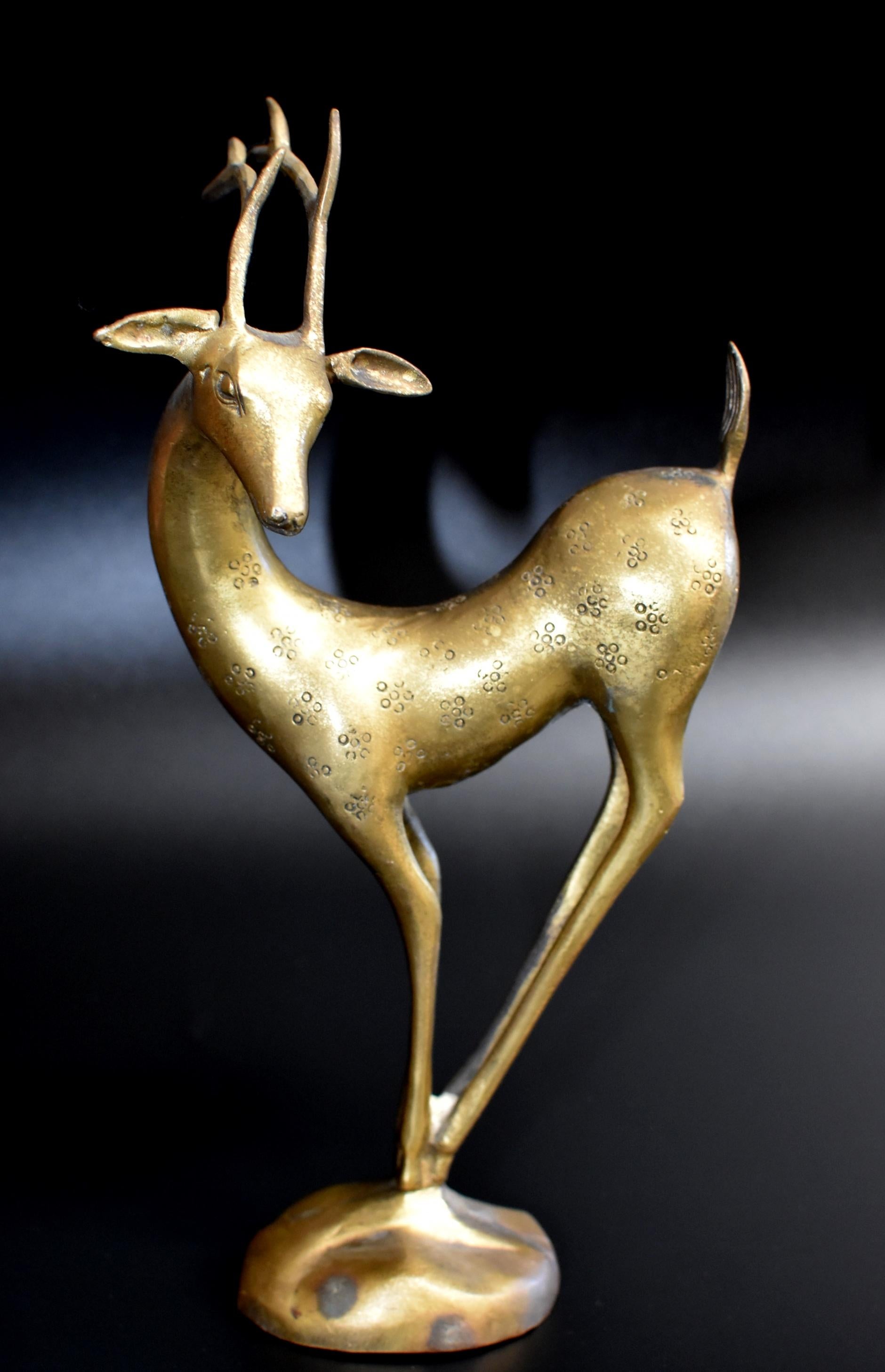 This beautiful deer is truly a work of art. Its artistry is achieved through skillful use of wonderful form, fluid lines and realistic expression. This type of the deer is a Chinese native called 