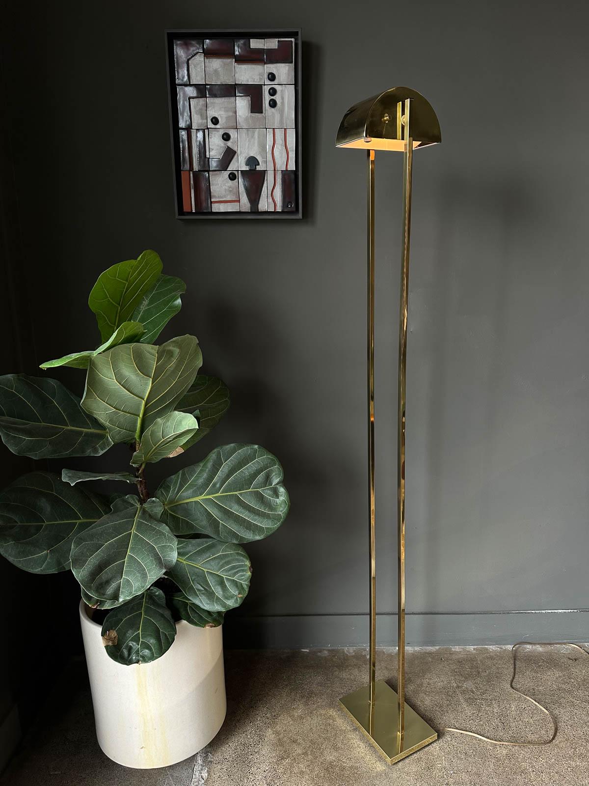 Brass Demilune floor lamp by George Kovacs for Koch + Lowy, 1970. Very good original condition with original wiring. Adjustable dimmer switch and beautiful brass finish with no rust or visible patina. Shade pivots to direct light where you desire.