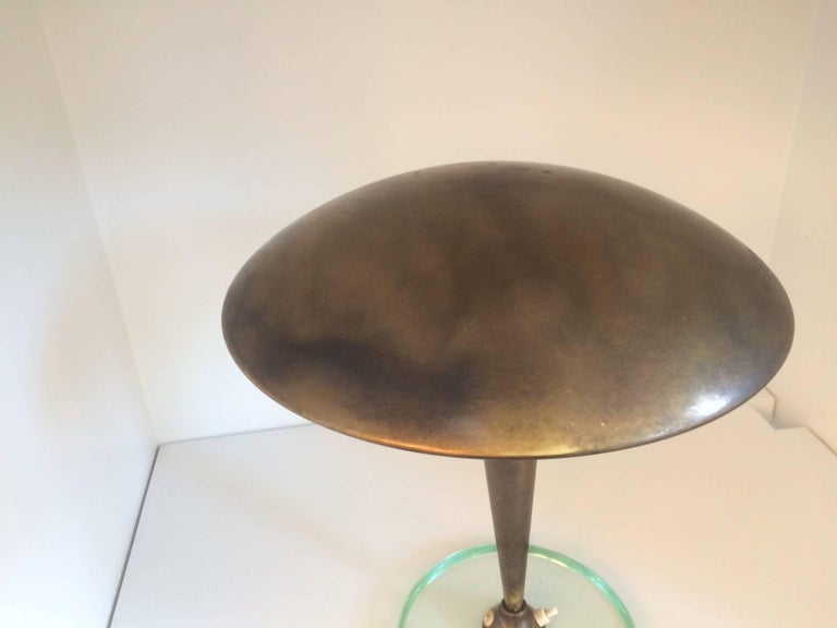Brass table lamp by Stilnovo.
Centre brass column mounted on 3/4
