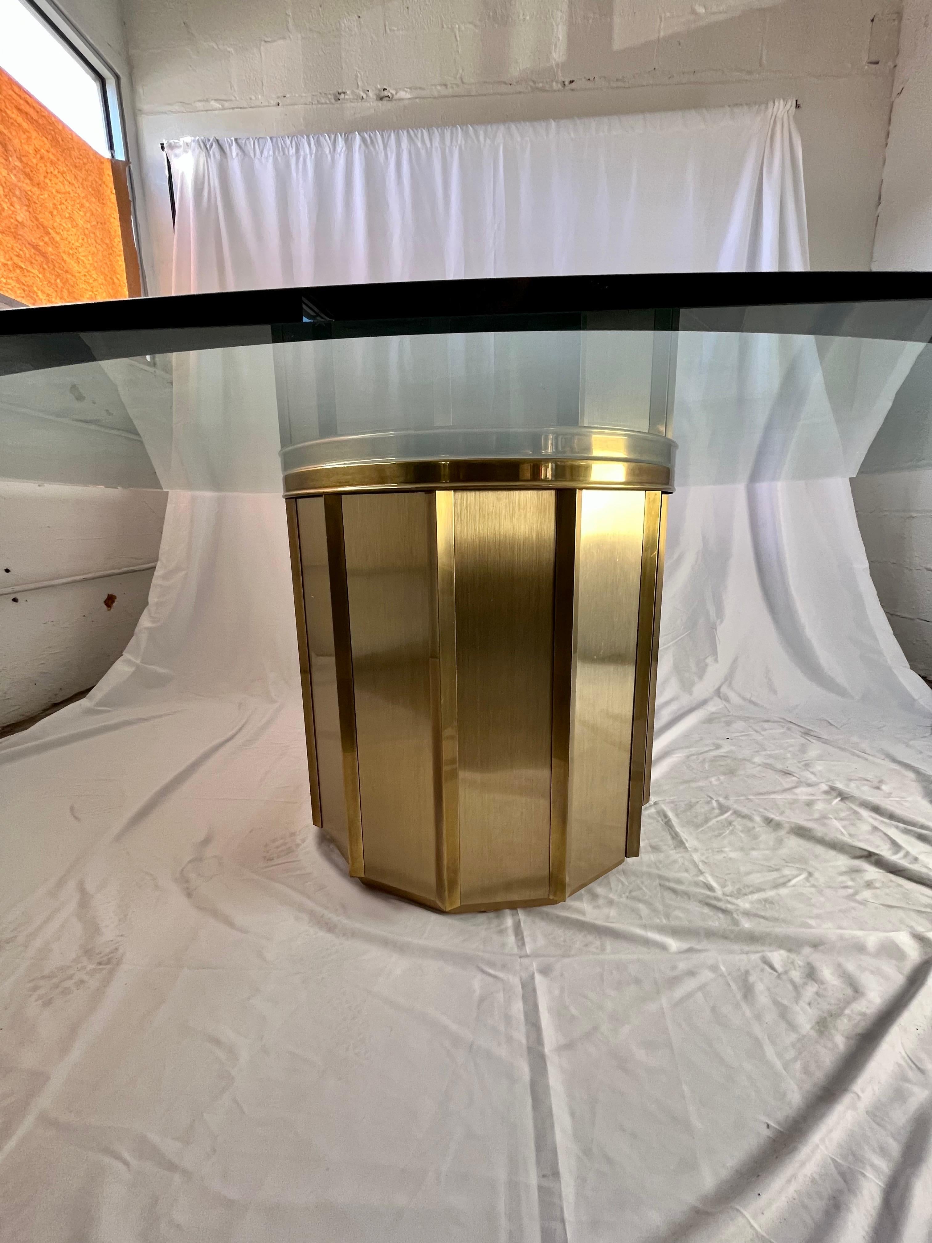 Brass drum table base beautifully designed by Bernhard Rohne for Mastercraft. Tremendous beveled edge glass top with faceted edges. Would make a great entry foyer table base as well.  
