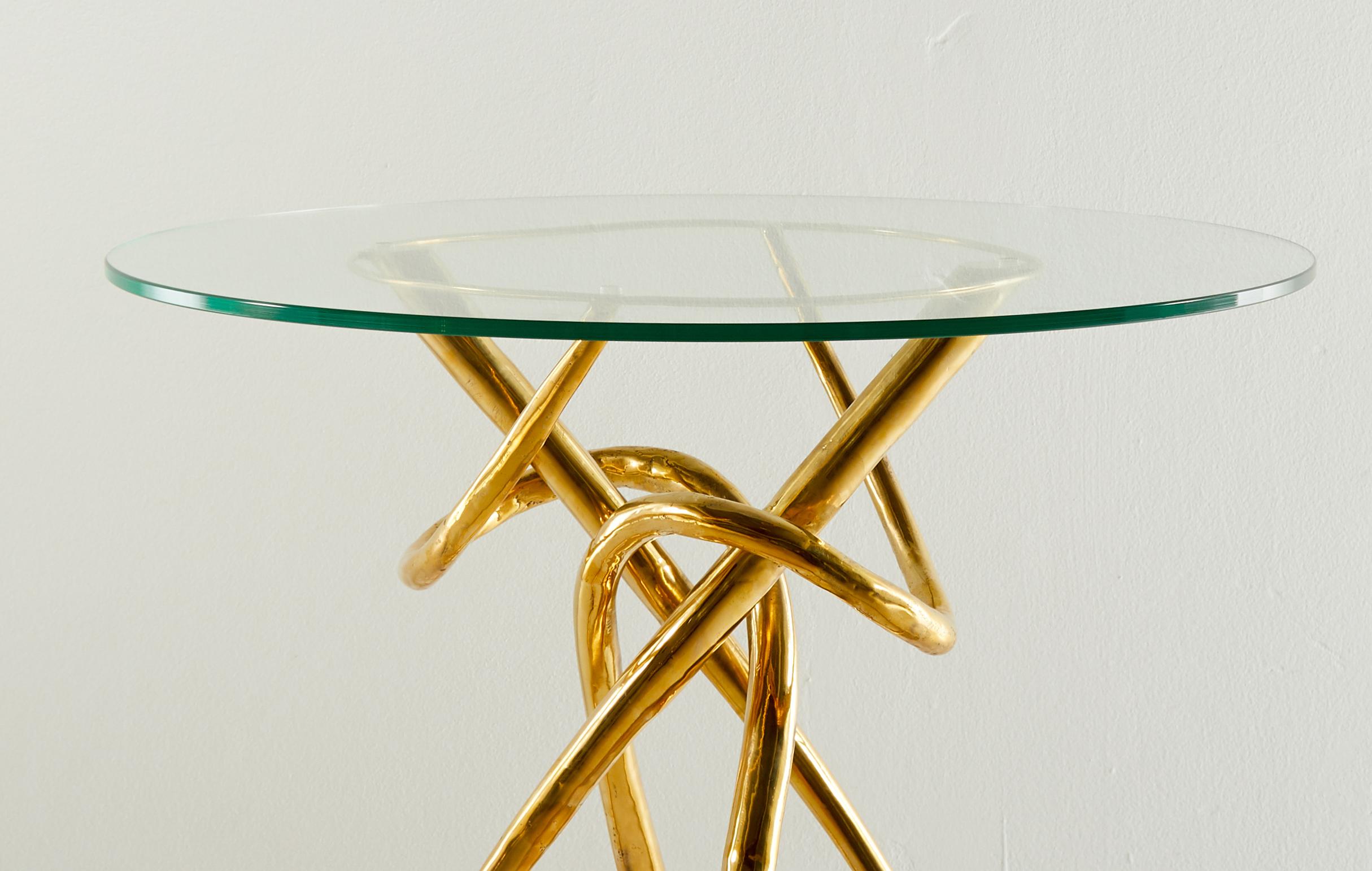 Brass dining table, Gordian Node, Misaya
Dimensions: W 60 x L 60 x H 70 cm
Hand-sculpted brass table.
Sold without the glass top.