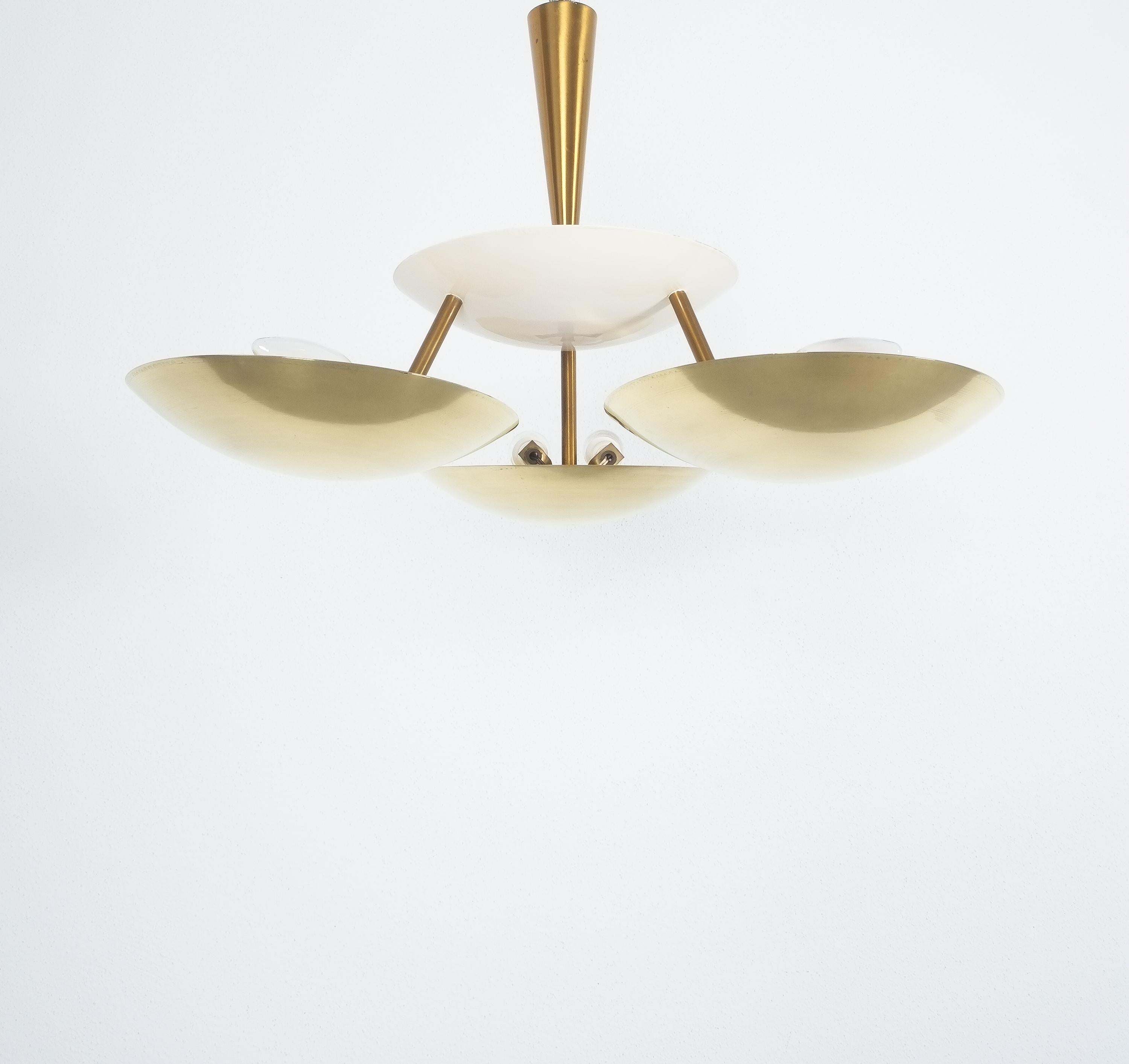 Floating brass disc semi flush mount in wonderful condition with a diameter of 22
