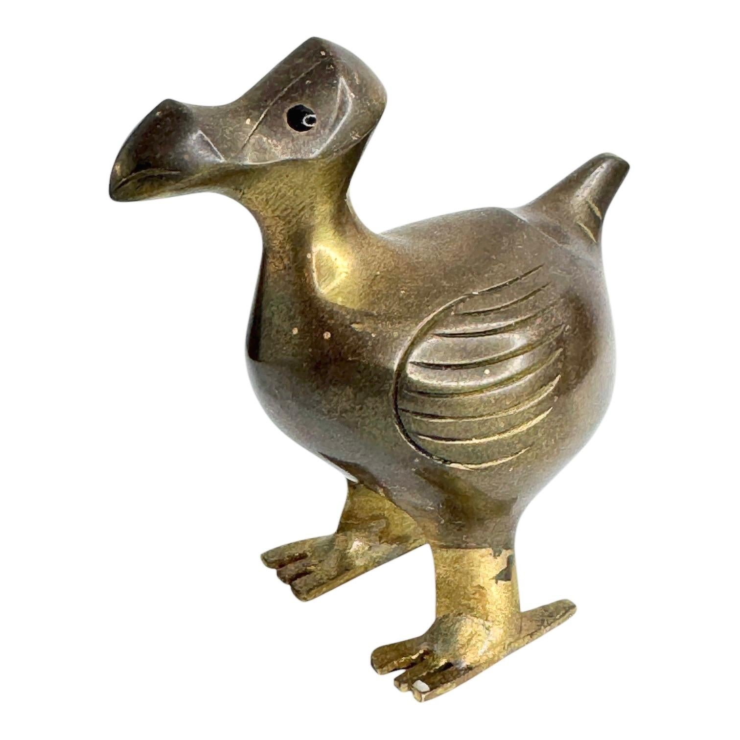 A lovely mysterious dodo bird figurine, flightless and extinct, this sturdy little guy is loaded with character. Made in the 1960s. Found at an estate sale in Nuremberg, Germany. It is not marked. A nice addition to your collection. It is in very