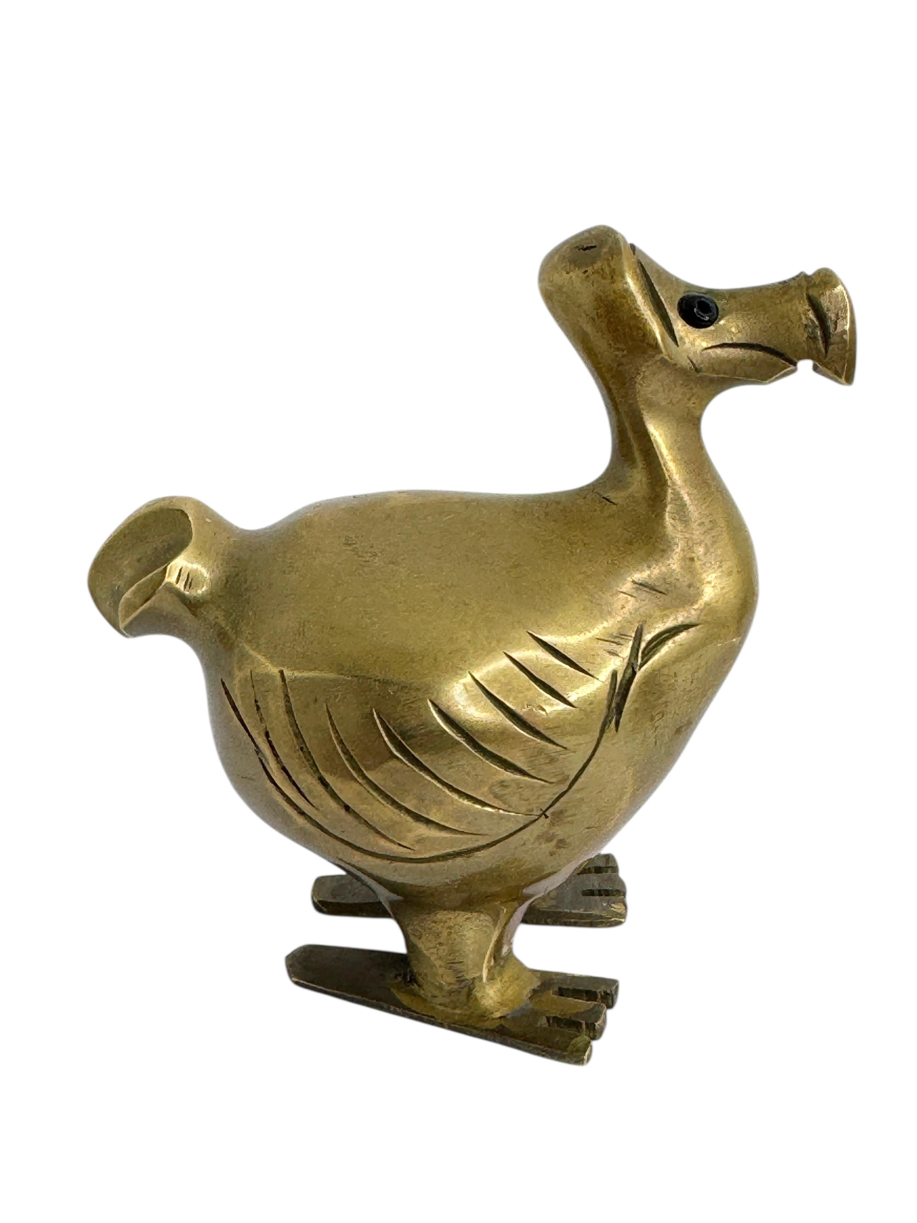 A lovely mysterious dodo bird figurine, flightless and extinct, this sturdy little guy is loaded with character. Made in the 1960s. Found at an estate sale in Nuremberg, Germany. It is not marked. A nice addition to your collection. It is in very