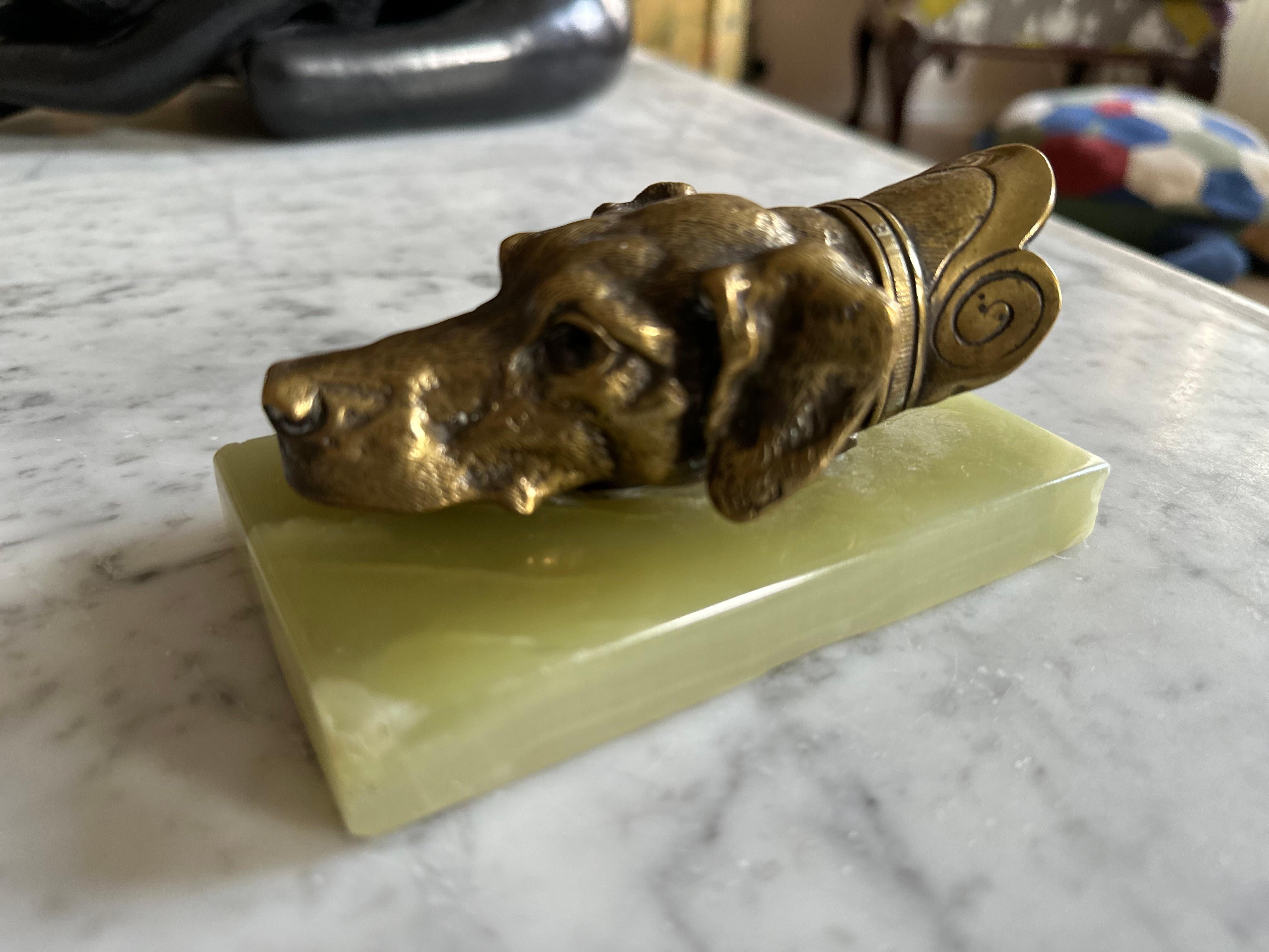Brass Dog Head Letter Clip on Green Onyx Base, Germany, 1920s
This elegant letter and document clip from the 1920s is a unique desk accessory and a perfect gift for dog lovers. The clip itself is crafted from solid cast brass in the shape of a