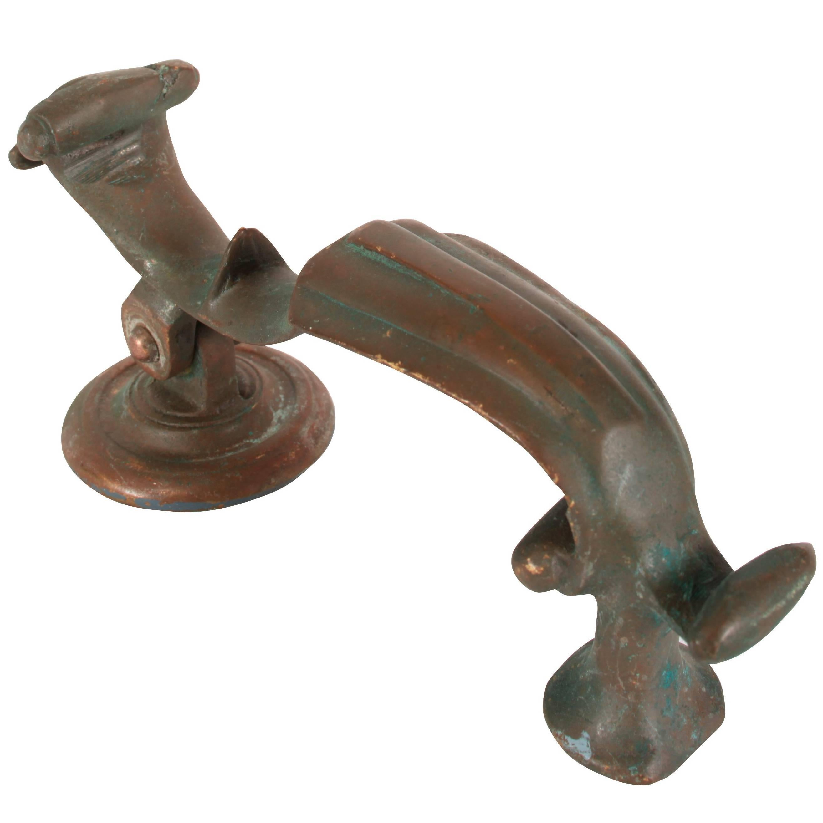 A Georgian style brass doctor's door knocker with typical s-shaped scrolled rapper, wonderful character and aged patina. Strike plate is not original.
Search term: Edwardian style, victorian style, Federal style.