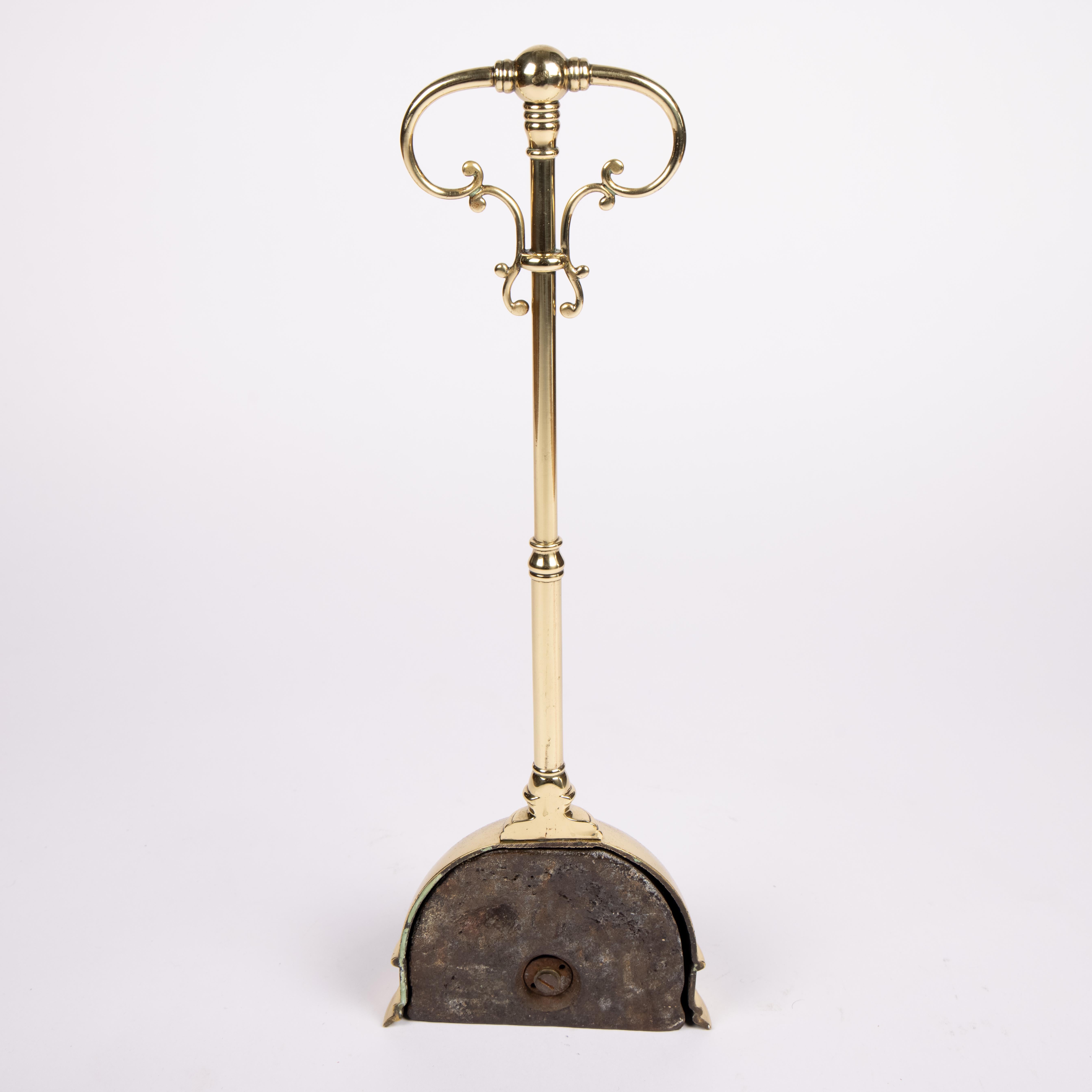19th Century Brass door porter For Sale