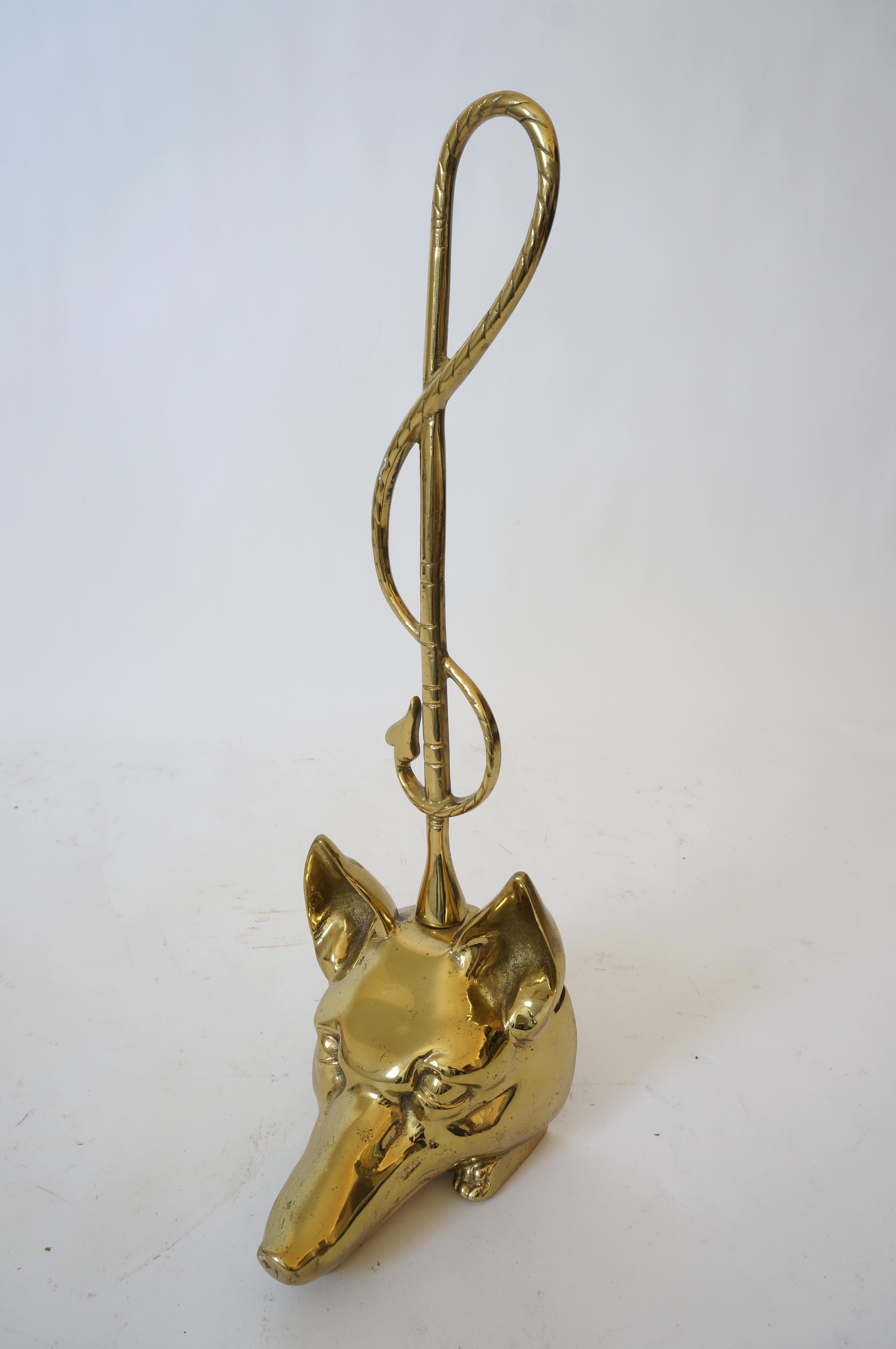 This stylish and chic fox-head-form door stop has been professionally polished and lacquered.