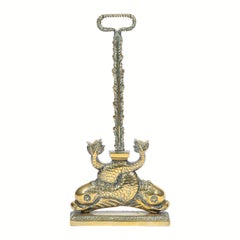 Brass door stop with two Intertwined Dolphins