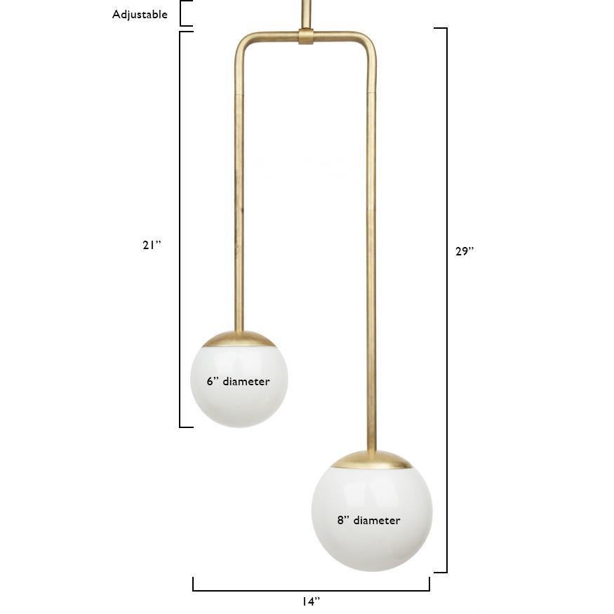 An asymmetrical metal pendant light to illuminate your dining room, living room, kitchen. This modern lighting pendant also works well in a commercial setting restaurant, retail, or office space.
Designed by Michele Varian
Unfinished brass (clear