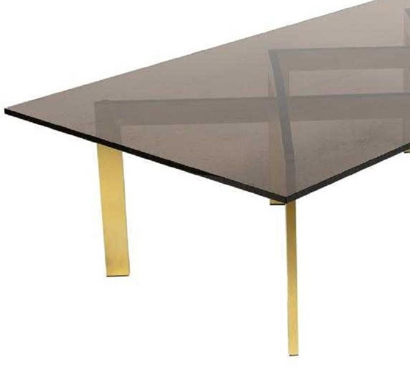 Brass double X base coffee table by Thayer Coggin with a smoked glass top.