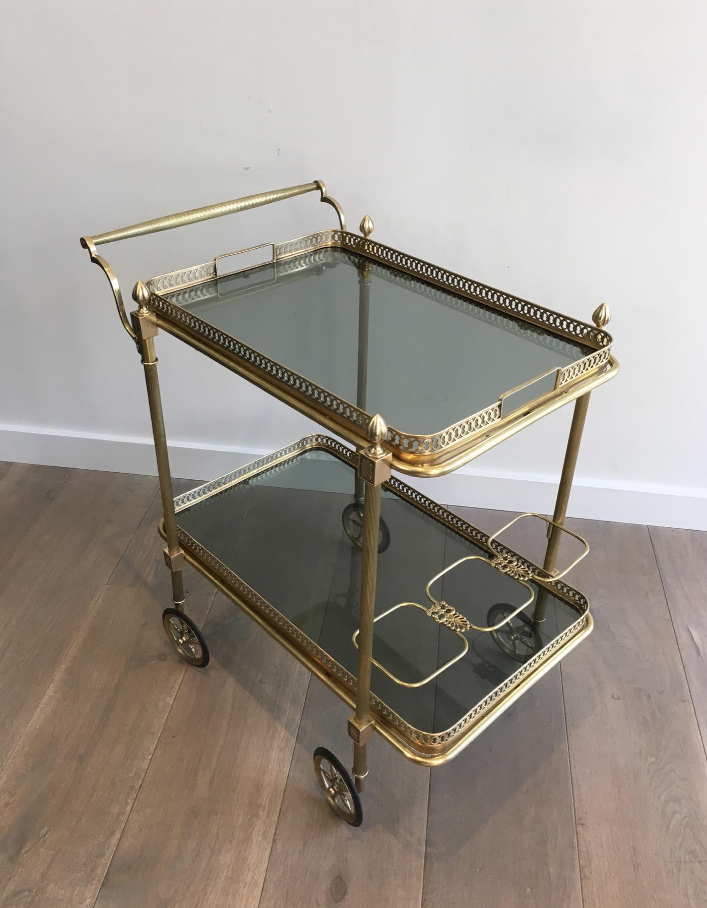 Neoclassical Brass Drinks Trolley with Blueish Glass shelves by Maison Jansen For Sale