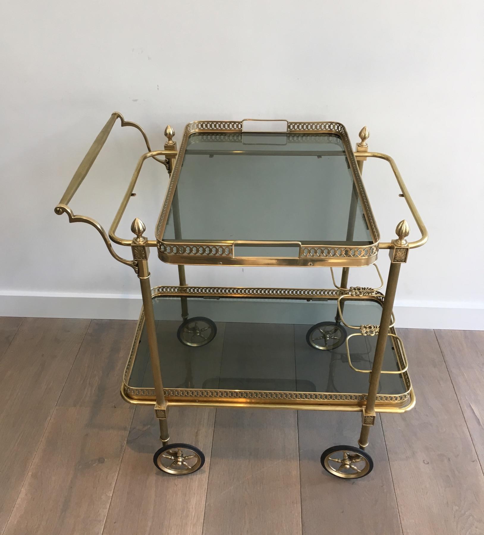 French Brass Drinks Trolley with Blueish Glass shelves by Maison Jansen For Sale