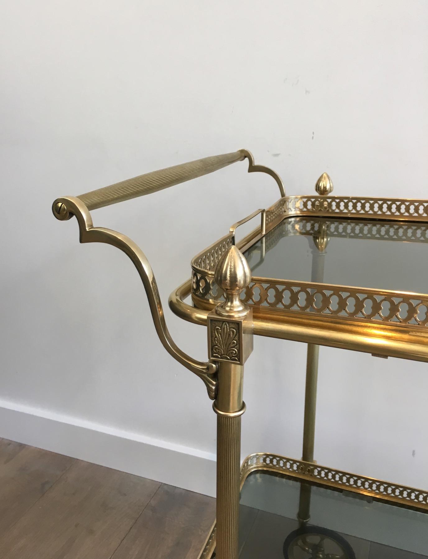 Mid-20th Century Brass Drinks Trolley with Blueish Glass shelves by Maison Jansen For Sale