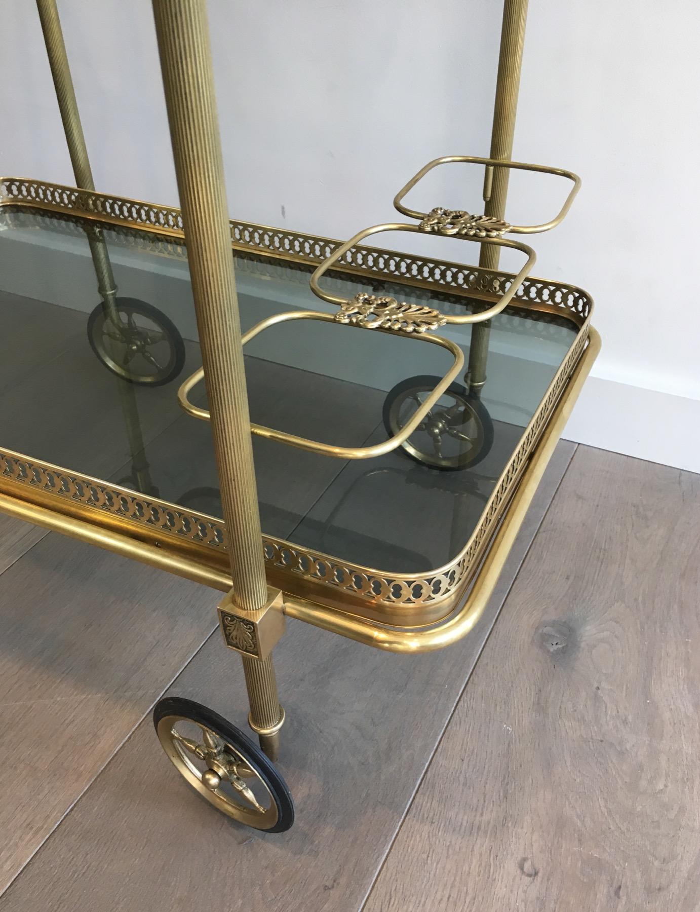 Brass Drinks Trolley with Blueish Glass shelves by Maison Jansen For Sale 3
