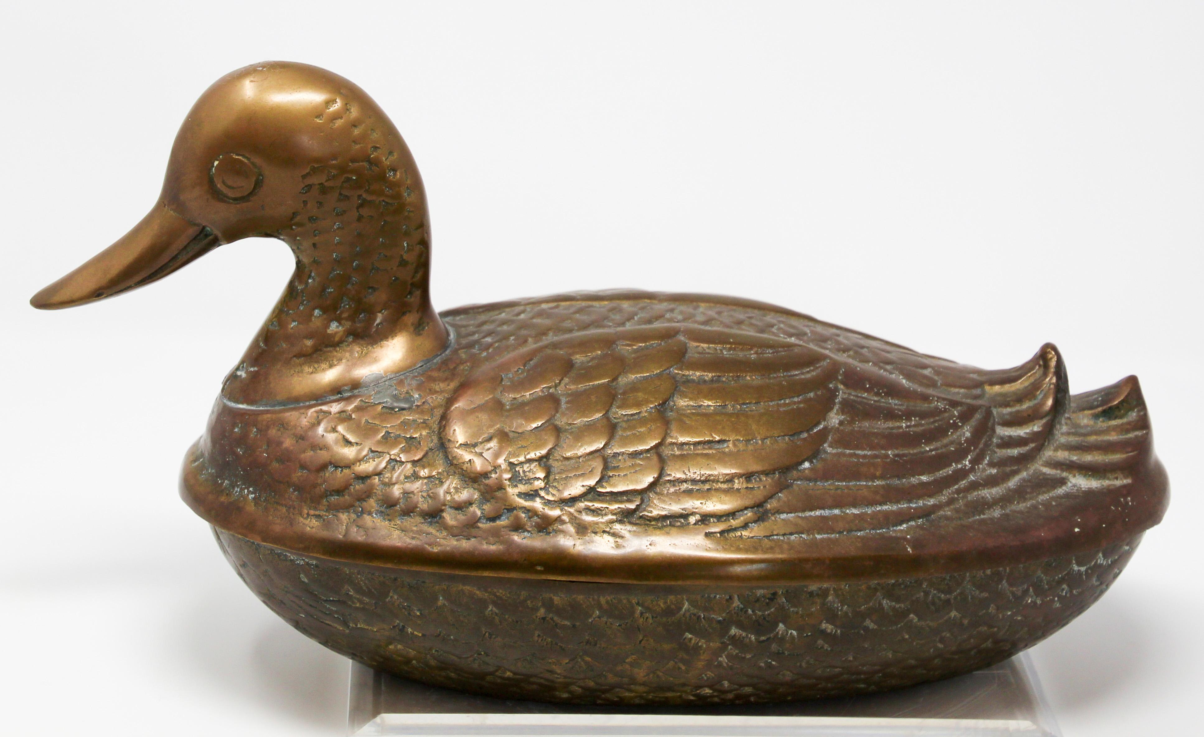 antique brass duck