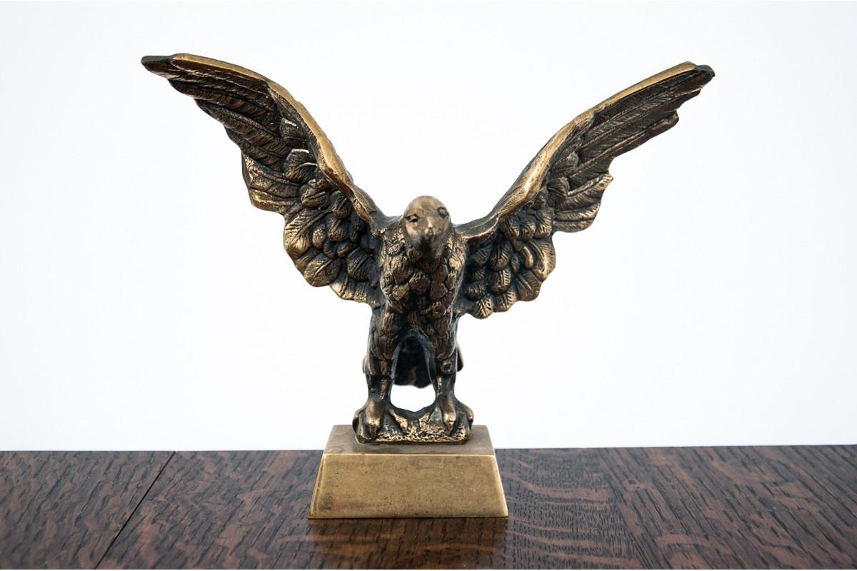 Brass figurine of an eagle.

Dimensions: height 17 cm / width 22 cm / depth 13 cm.