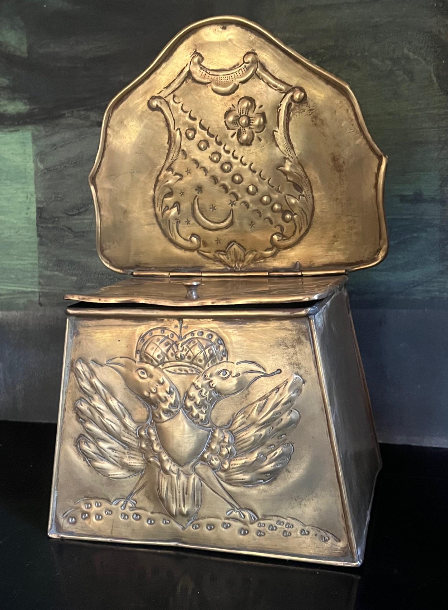 Handcrafted Polish brass lidded box embossed with a double eagle under a crown as well as a shield.  The hand crafted box has a ring on the back for hanging. 
