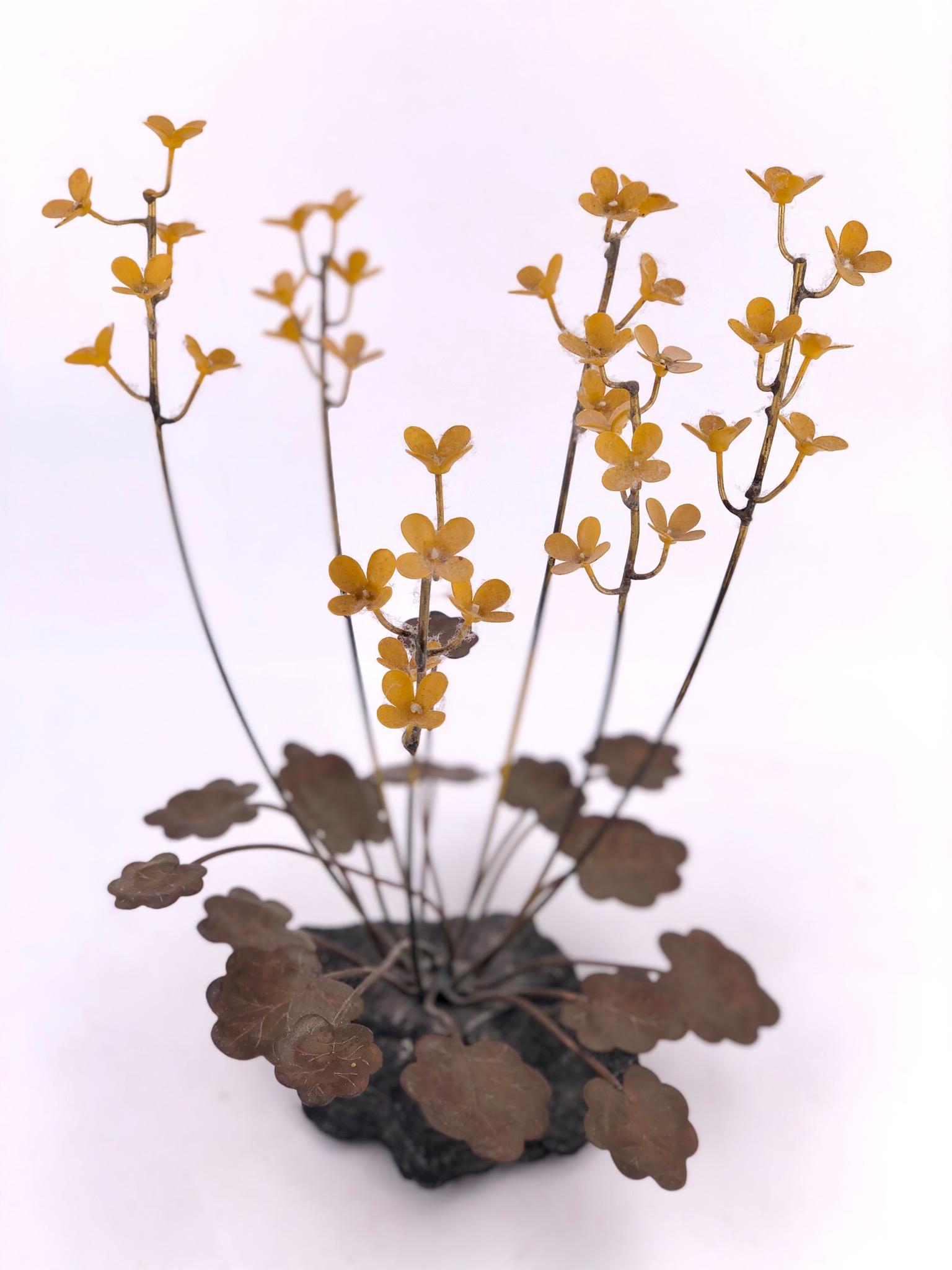 Nice flower sculpture with enamel. Finish in solid brass well-done piece shows the veins on each leaf its unsigned.