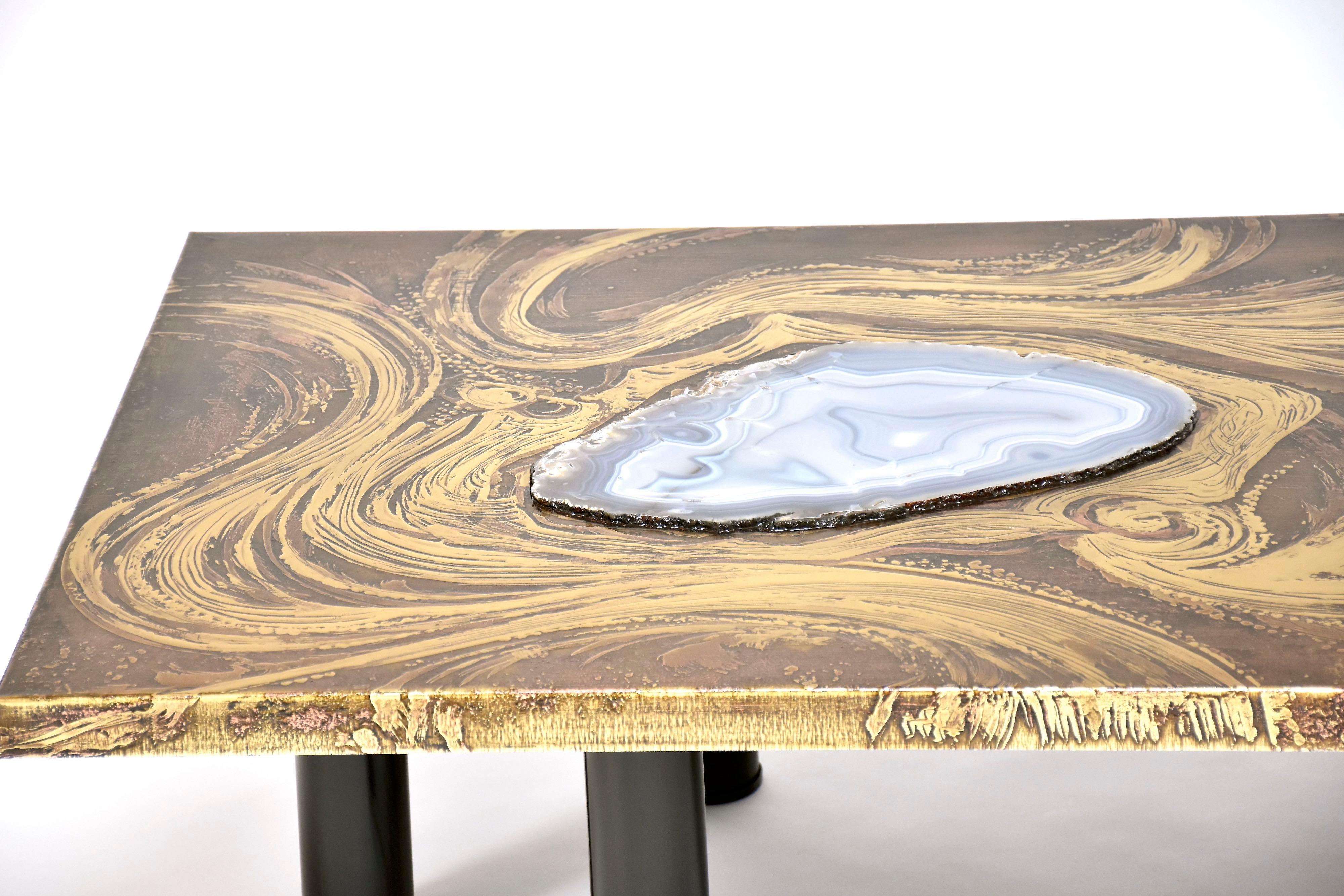 Stunning design coffee table by Belgian artist Marc D'Haenens.
Brass etched top with decor and blue agate inlay resting on 6 black legs.
Signed by the artist.
We bought the table from the daughter of the artist. 
The table was standing in the