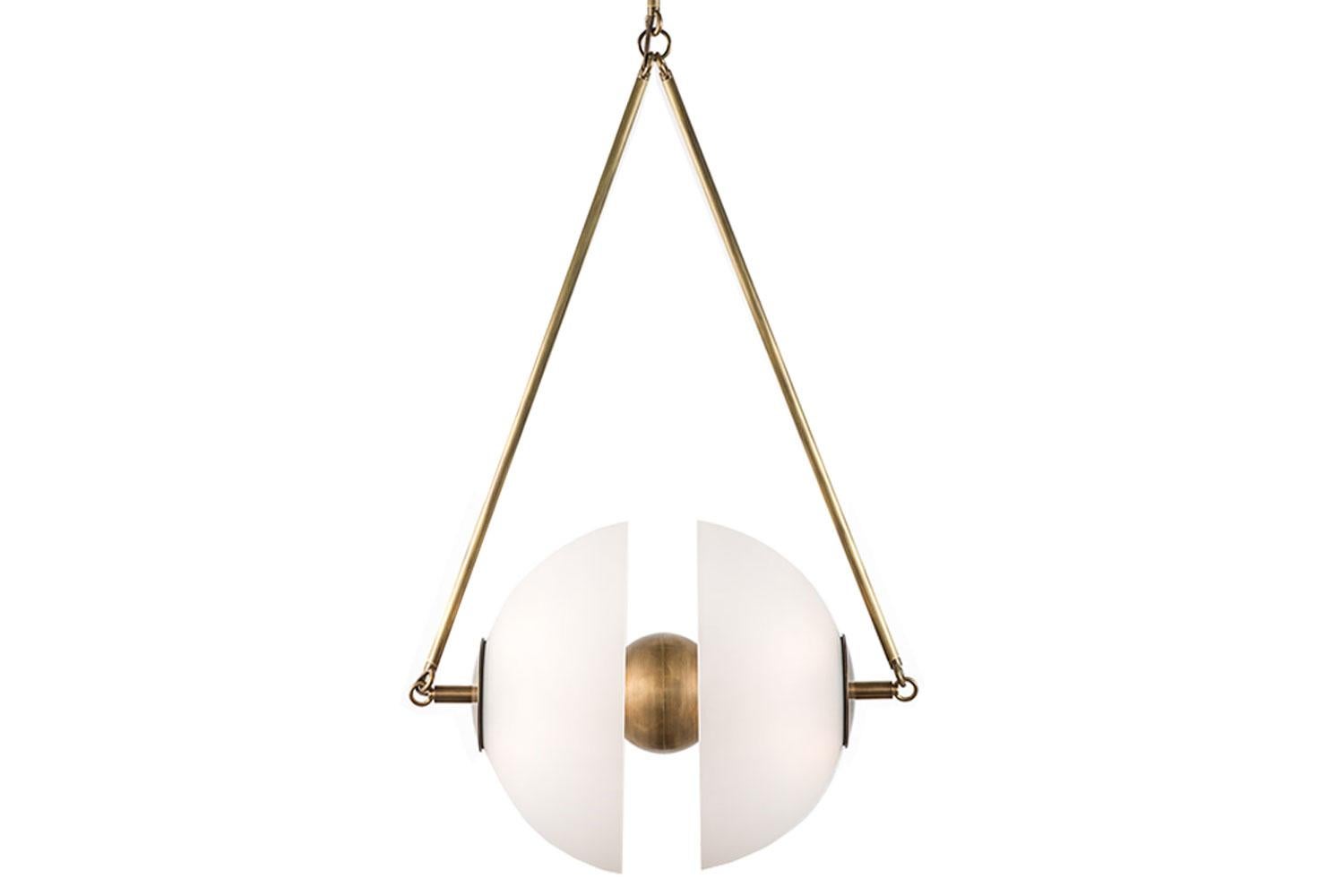 Synapse Small by Apparatus

Inspired by the mechanics of neural synapses, the aged brass orb floats in transit between two hand-molded glass domes.

This lighting is in excellent showroom condition. Used in showroom setting. Barely imperceptible
