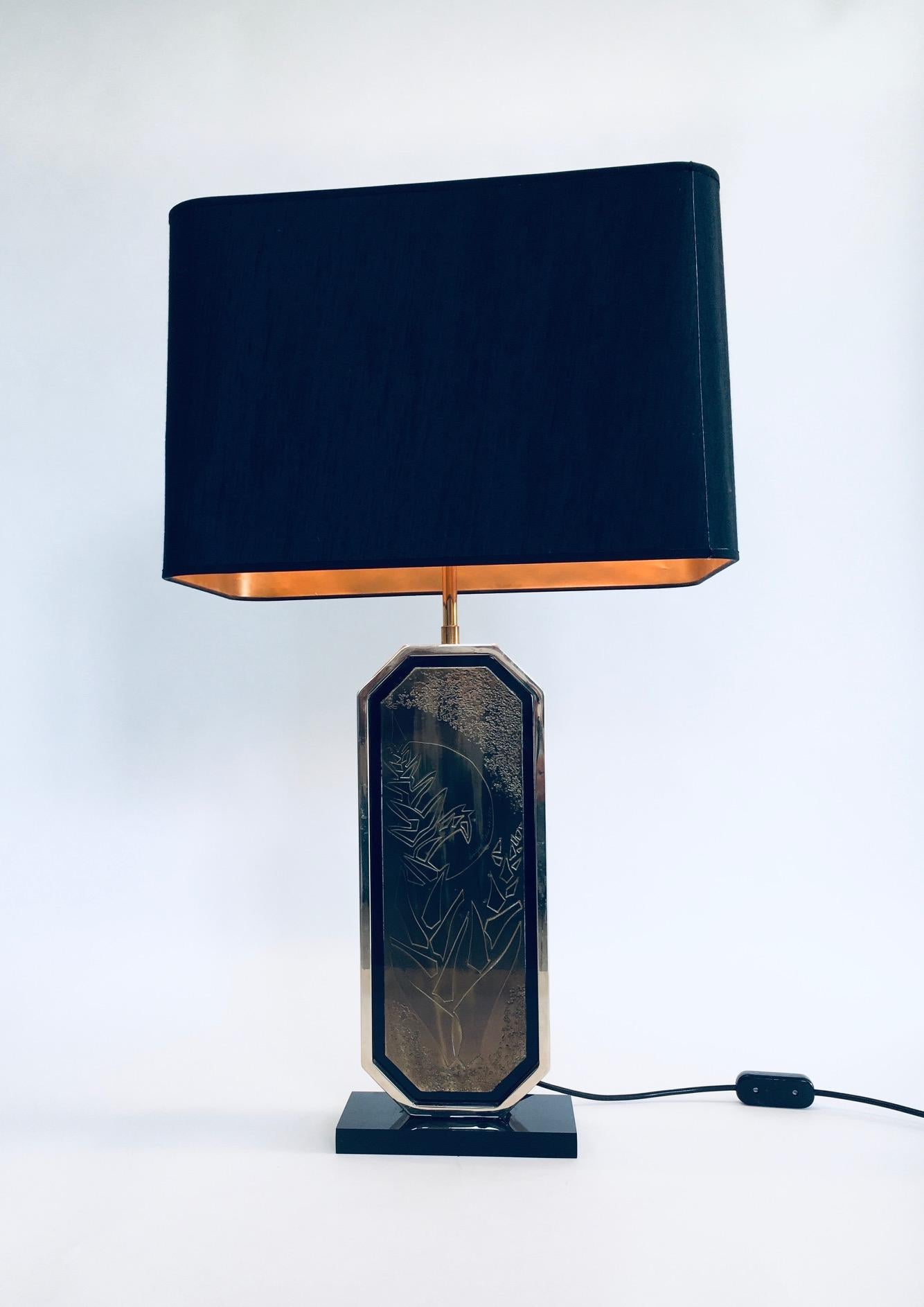 Vintage Postmodern Hollywood Regency Style Design Brass Etched Maho Table Lamp by George Mathias for M2000, made in Belgium in the 1970's. Designo Maho, numbered 65/250. 23 carat gold plated brass etched with black perspex. Black with gold inner