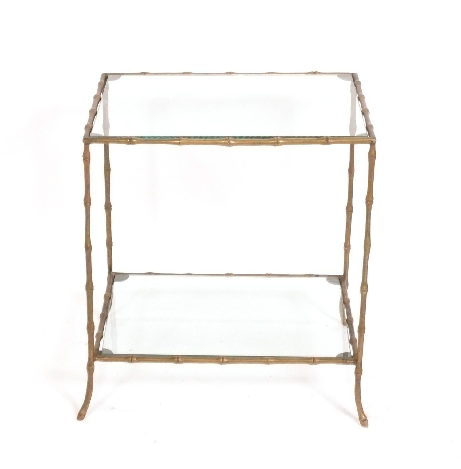 Elegant Brass Faux Bamboo Table, attributed to Maison Bagues, French, circa 1960s. Brass retains warm original patina. This table is a versatile size, and can be used as a side or end table, or dry bar in a living area, or as a nightstand in a