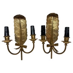 Applique in ottone a forma di piuma