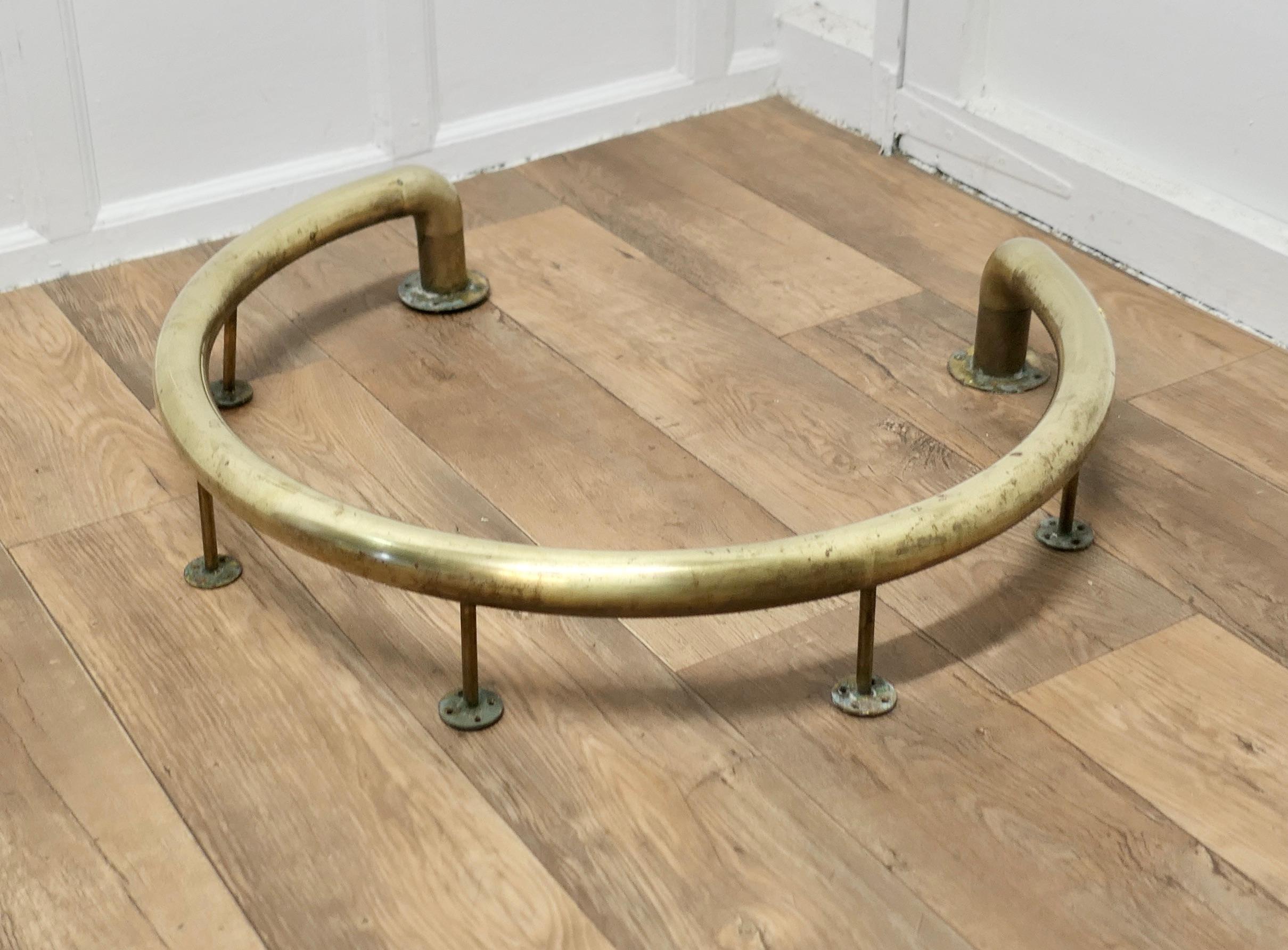 Industrial Brass Fender for a Round Free Standing Cast Iron Stove    For Sale