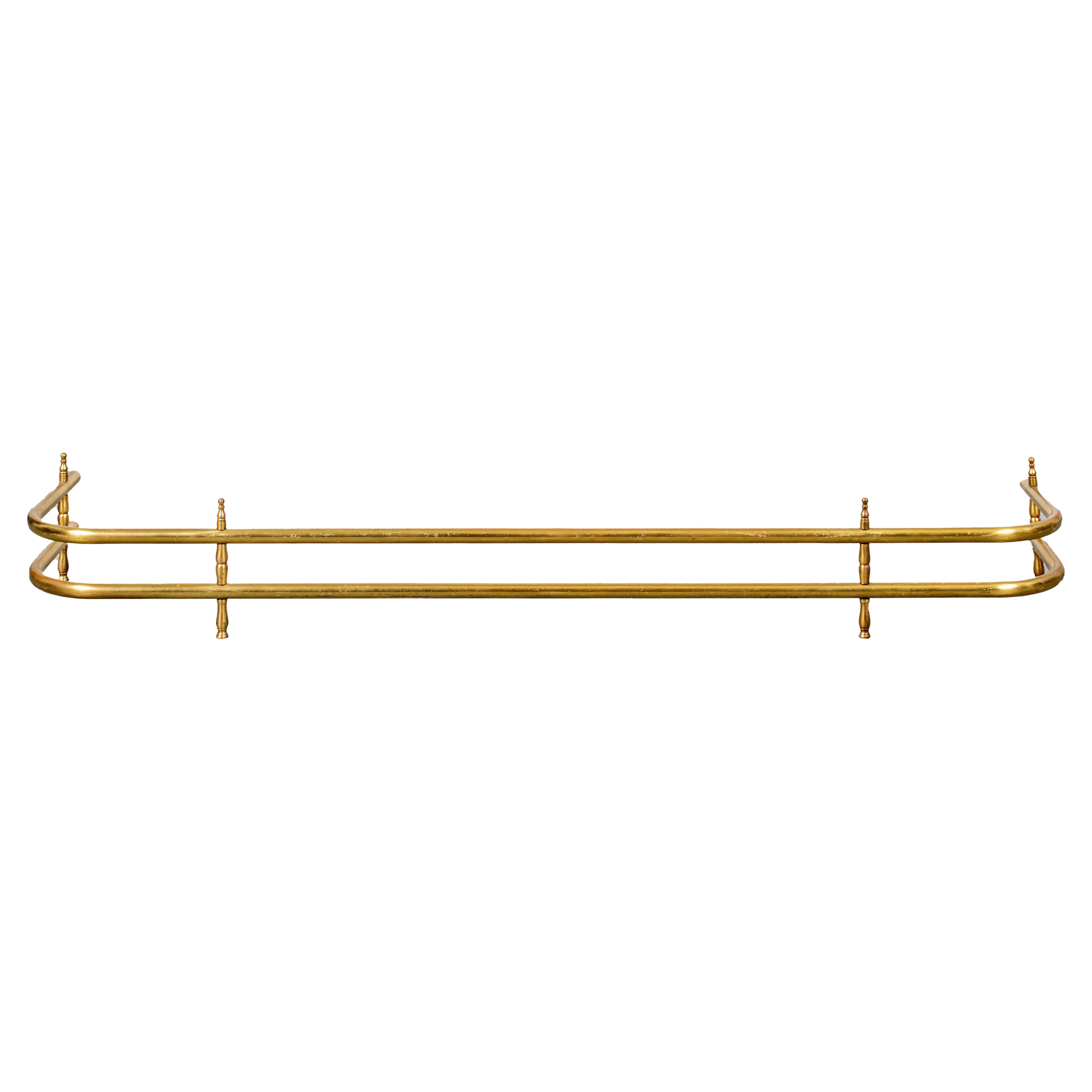 Brass Fender With Twisted Rail Motif For Sale