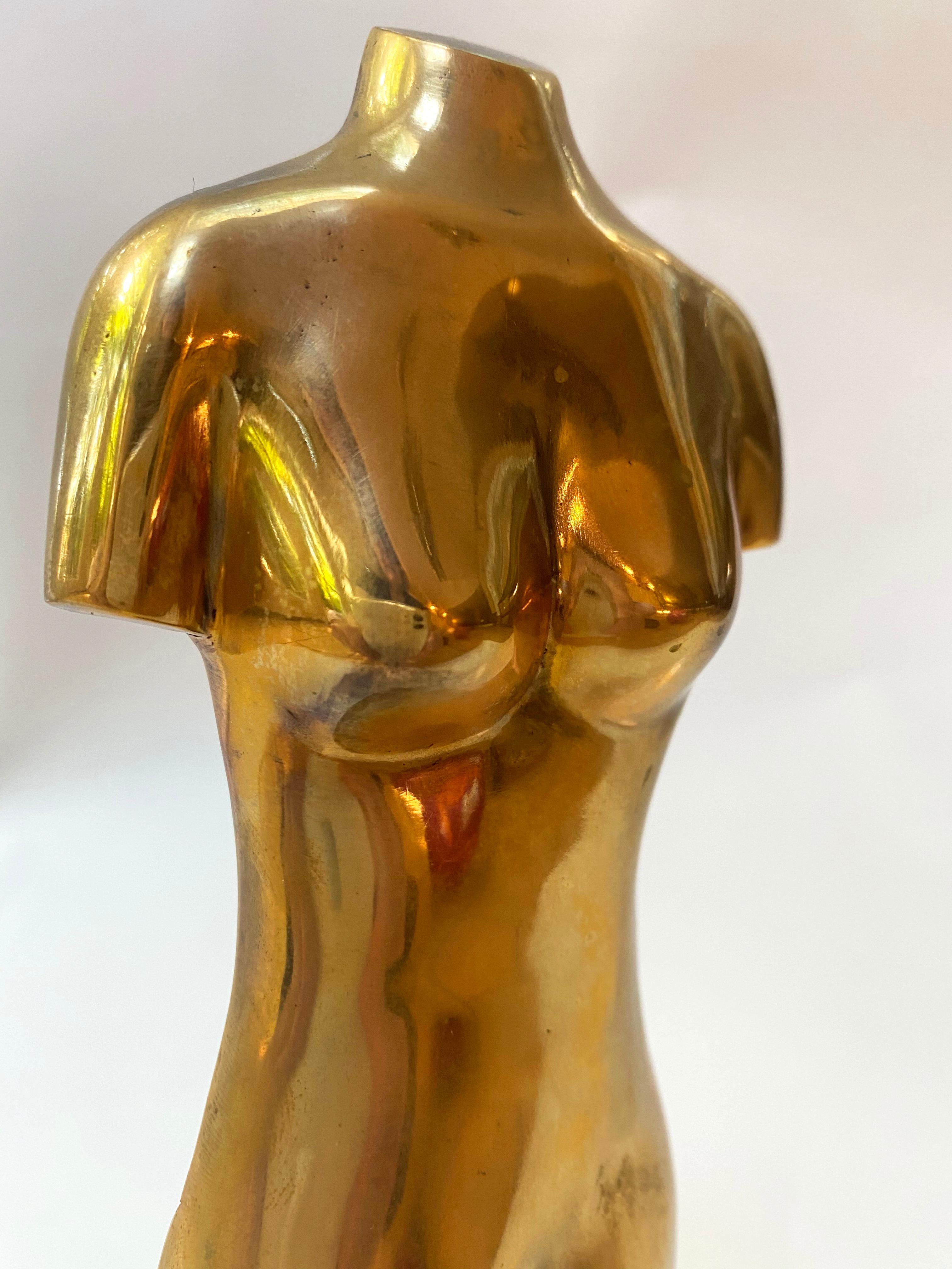 A striking and fun brass figural sculpture by Dr. Henry 
