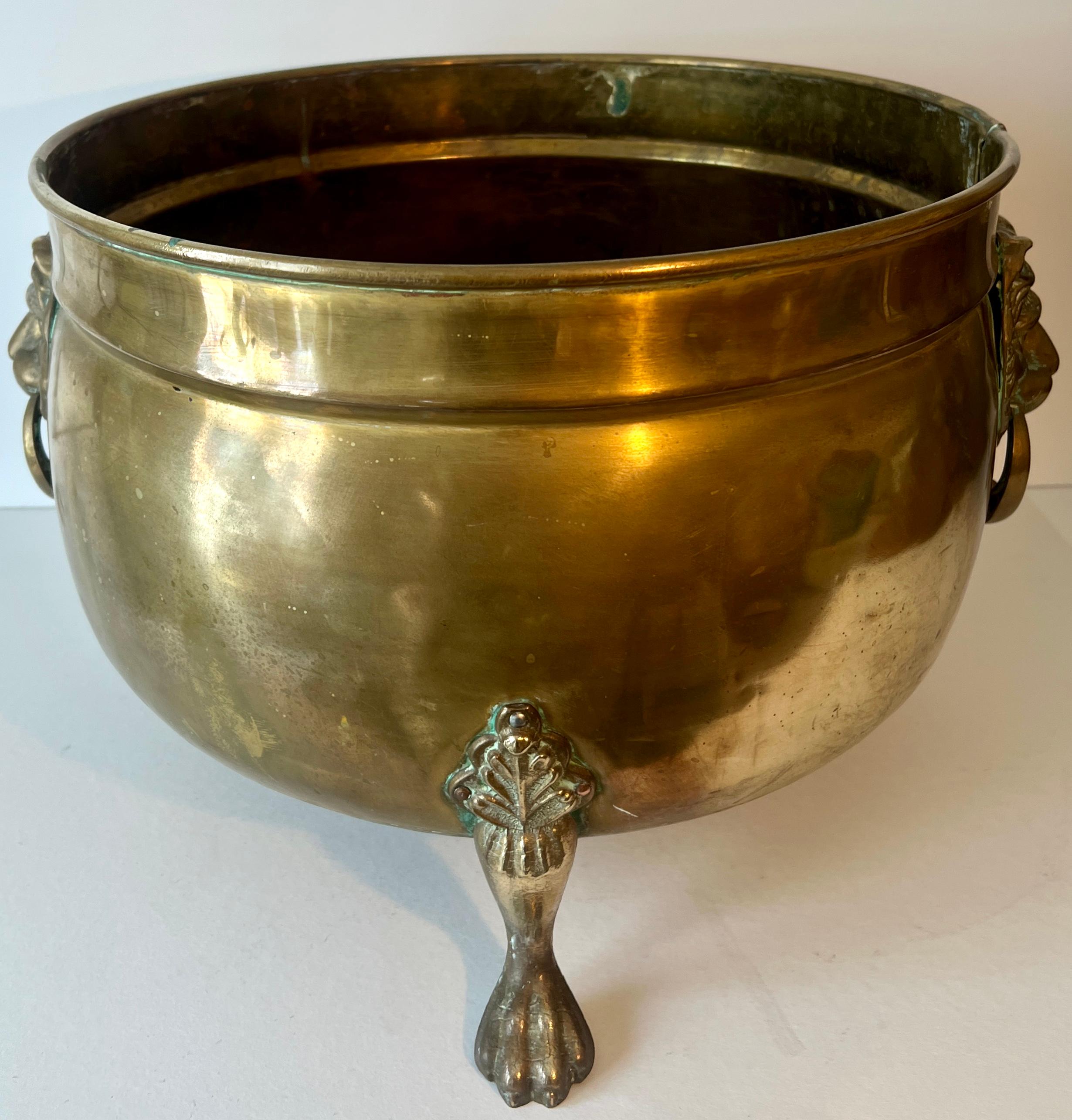 English Brass Fireplace Pot or Planter with Lion and Ring Handles For Sale