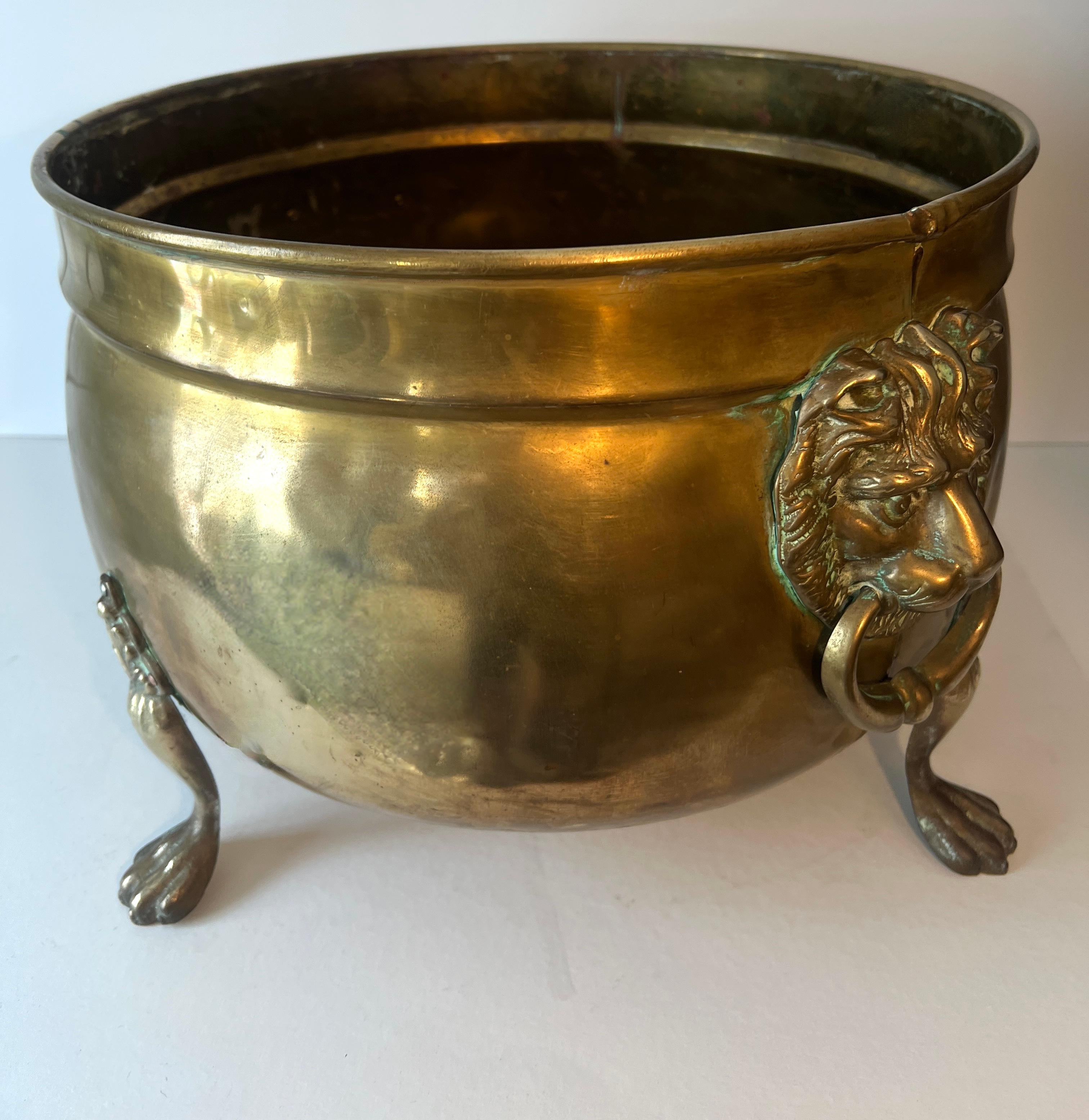 Brass Fireplace Pot or Planter with Lion and Ring Handles In Good Condition For Sale In Los Angeles, CA