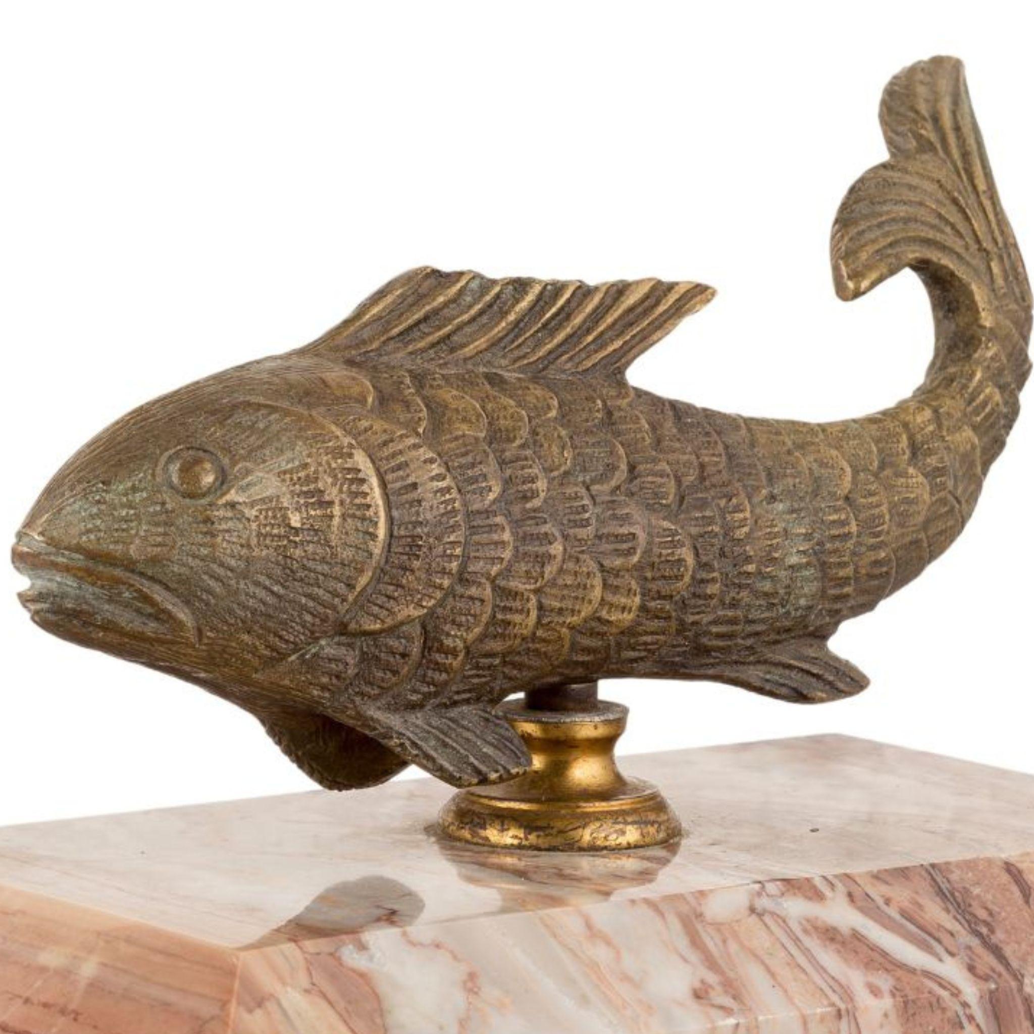 Brass Ariel brass fish with beige marble base For Sale