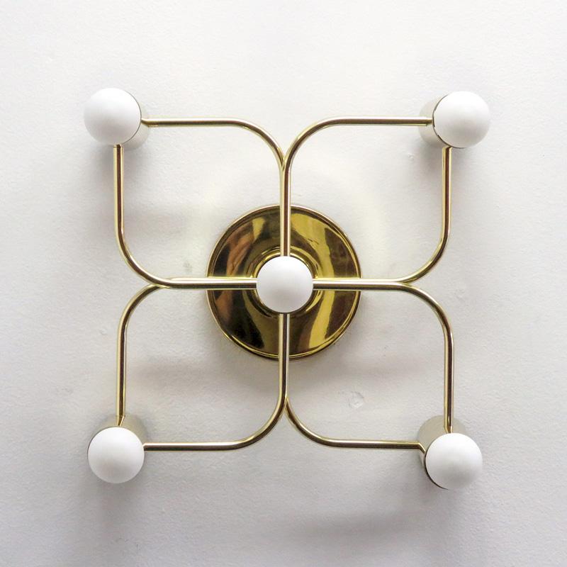 Wonderful German five-light polished brass flush mount lights, can be used as wall or ceiling lights. Wired for US standards, five E12 sockets per fixture, max. wattage 40w each, bulbs provided as a one time courtesy. Priced individually.