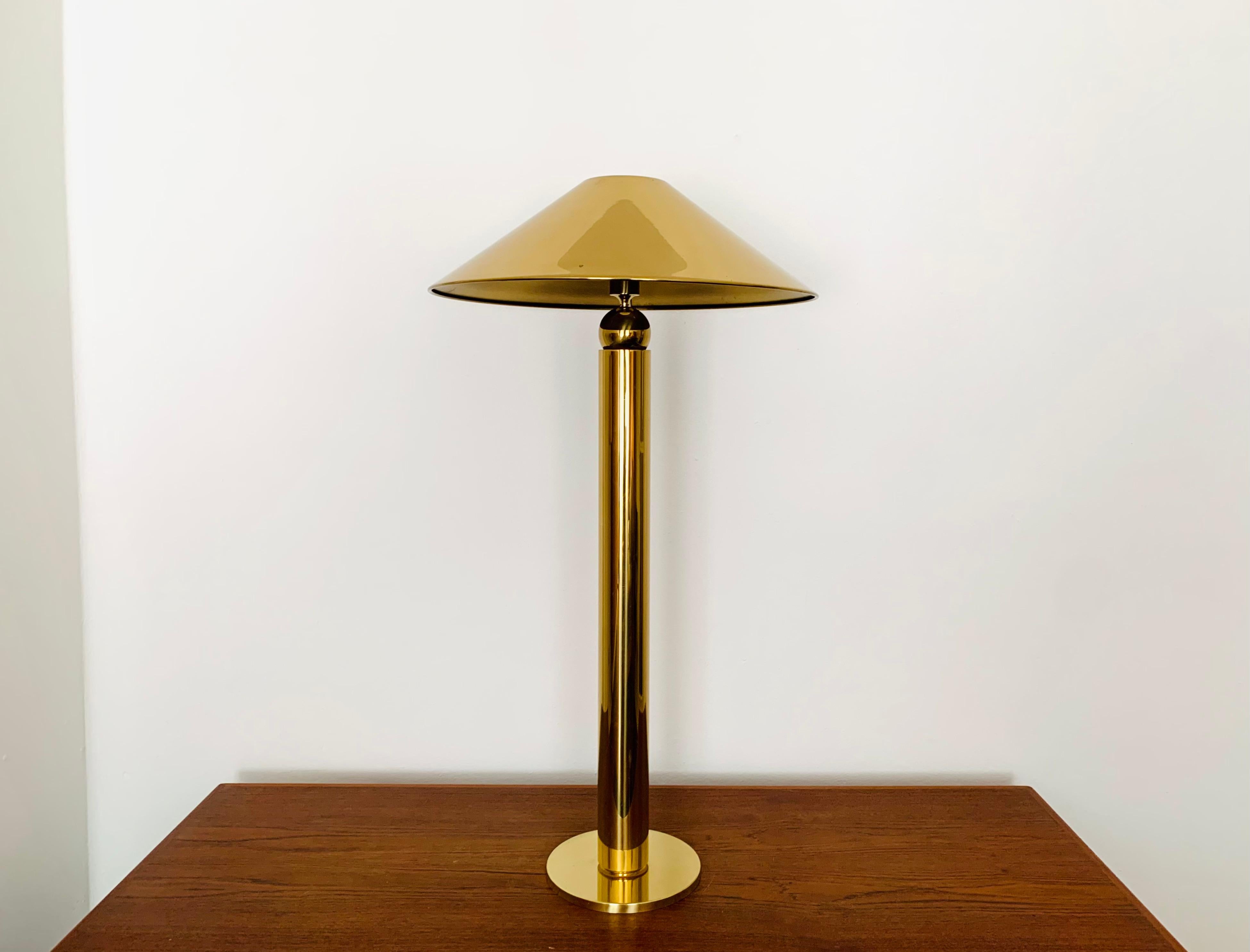 Very beautiful and rare brass floor lamp from the 1970s.
The lighting effect of the lamp is extremely beautiful.
The design and the very beautiful details create a very noble and pleasant light.
The lamp creates a very cozy atmosphere and is of