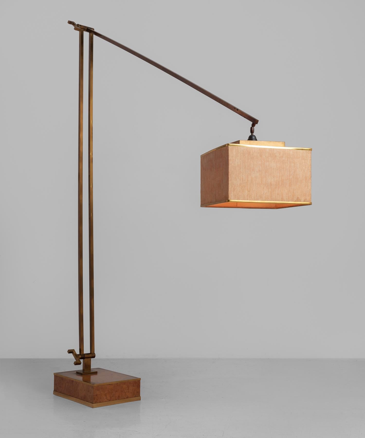 Brass floor lamp by Romeo Rega, Italy, circa 1970.

Elegant floor lamp with wooden base, brass structure and original fabric shade.

Base - 11.25