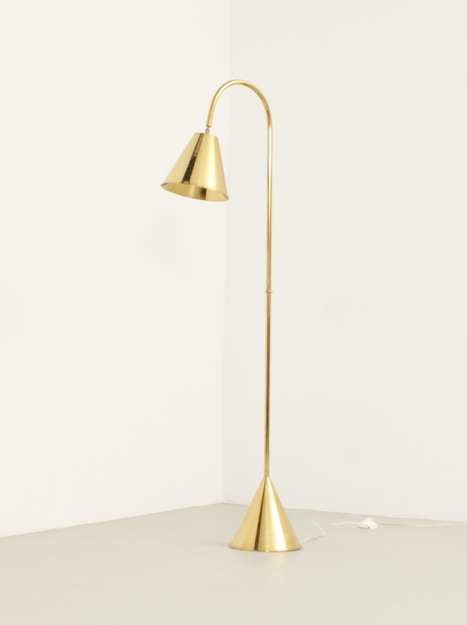 Floor lamp produced in 1950's by Valenti, Spain. Rare edition entirely in brass with ball joint that allows movement of the shade. Signed.