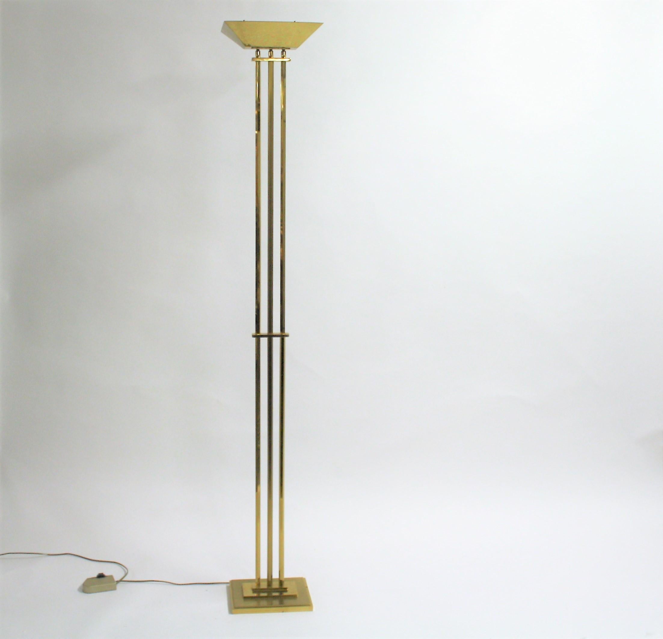 Charming lamp from the manufacturer 'Deknudt' in the style of Willy Rizzo. 

The lamp is made out of brass and has a glass plate above the light bulb to created a diffuse light.

The lamp works with a R7 light and is dimmable.

1970s -