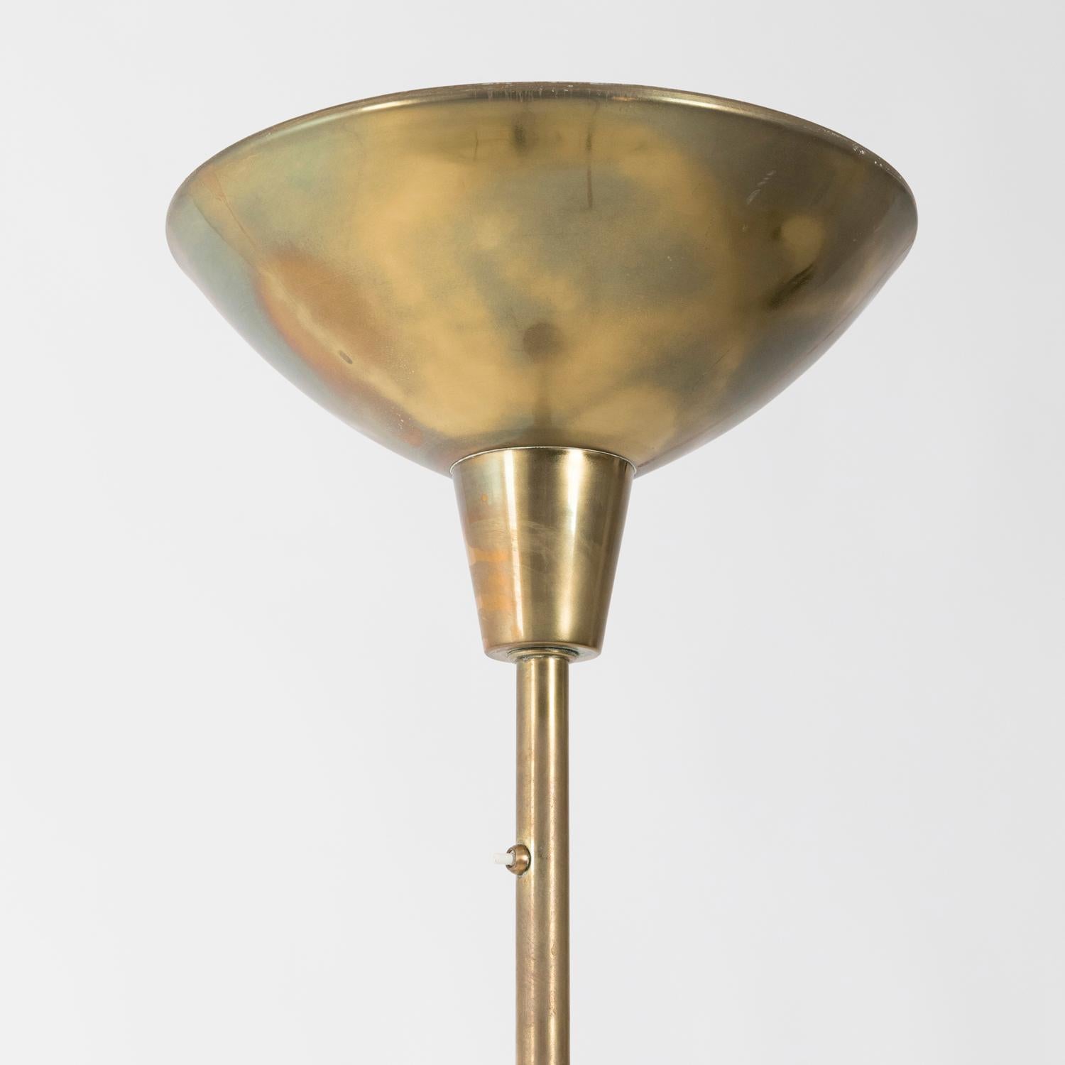 Brass floor lamp from the 1940s, possibly a prototype or a pre series model for the LTE1 lamp designed by Luigi Caccia Dominioni for Azucena in 1948. The lamp carries a high quality and some features which are identical to those present of the