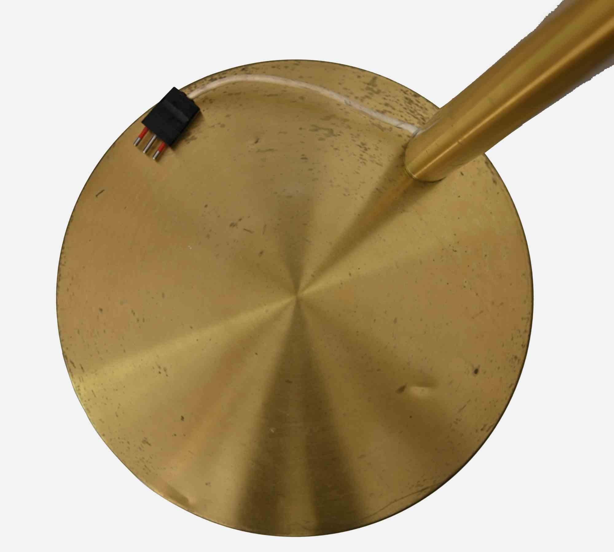 Brass floor lamp is an original design lamp realized in the Mid of 20th Century.

Italian Production.

A brass lamp with 7 lights.

Good condition.

Dimension base: 39 x 39 cm

A design piece that cannot miss in your room!
