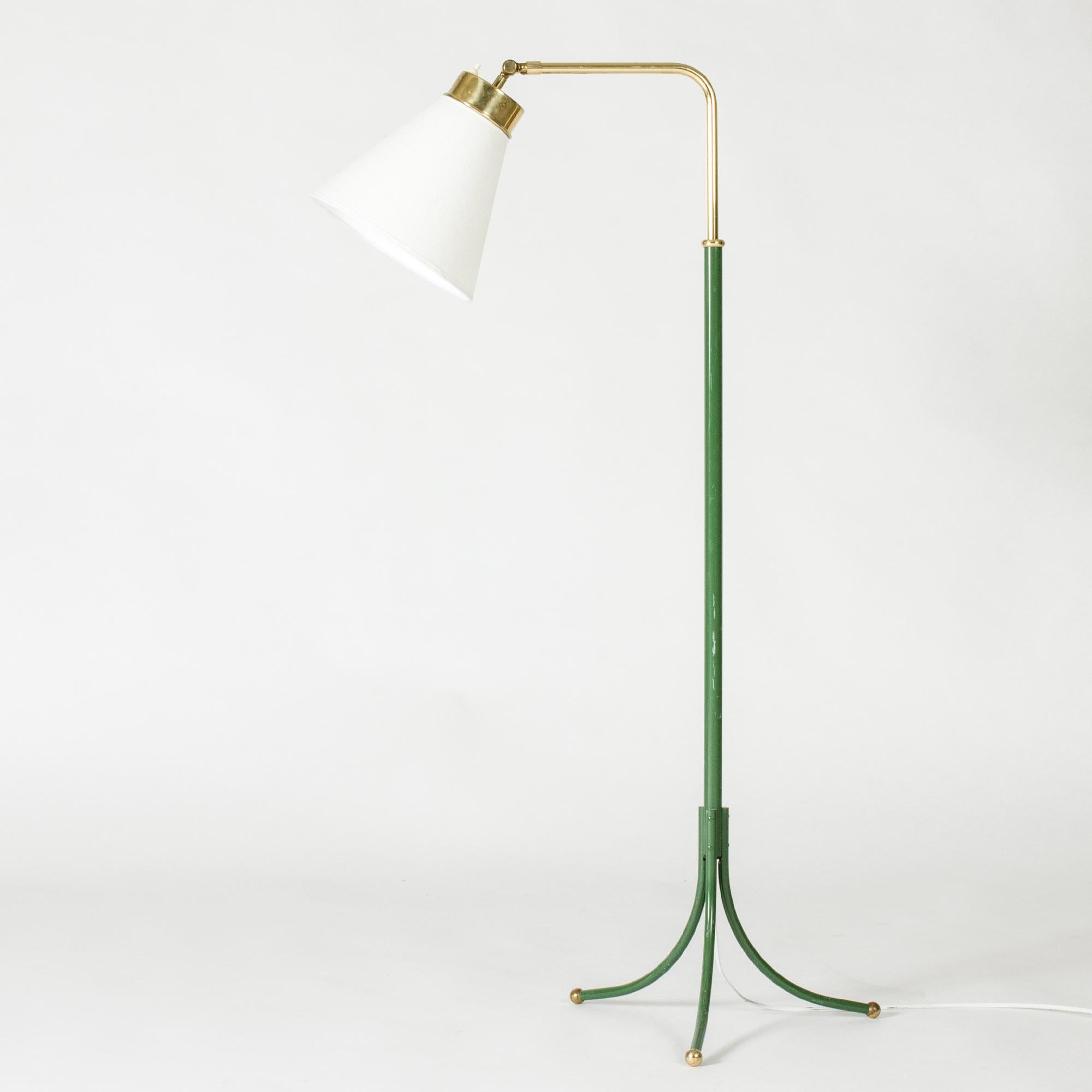 Brass floor lamp with green stem by Josef Frank, model 1842. Designed in 1932. Slender form with nicely curved tripod base, with balls at the ends.

Height 97-150 cm.

About Josef Frank: 
Josef Frank was an Austrian-born architect and designer known