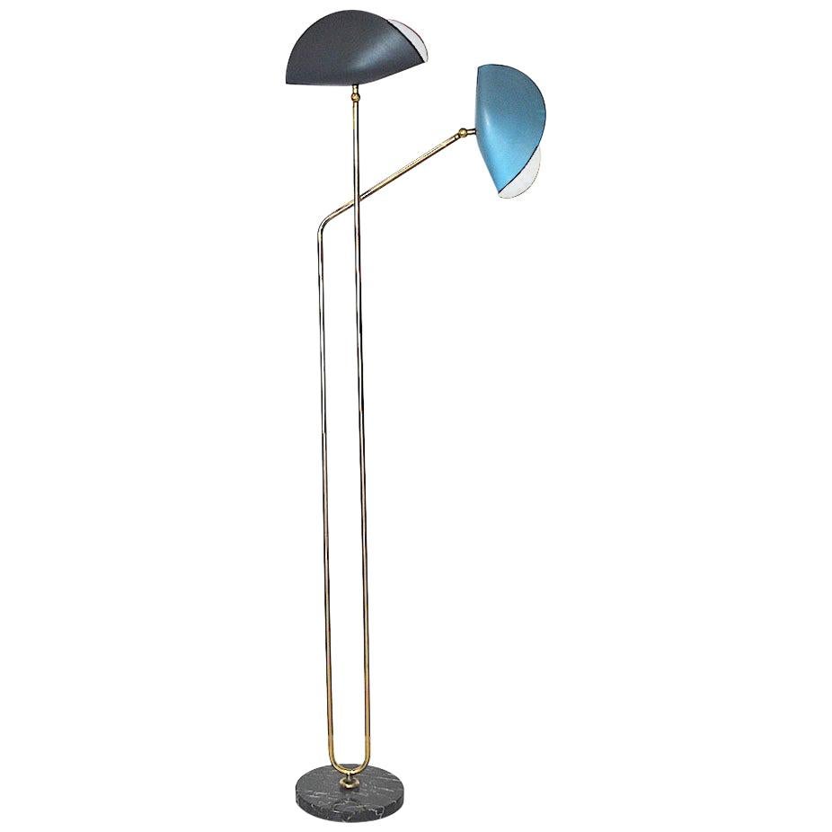 Italian floor lamp in brass and marble base, designed by Cellule Creative Studio for Gallery Misia Arte.

Misia Arte is an historic Italian gallery in business for 40 years, always active in the design and decorative arts scene.