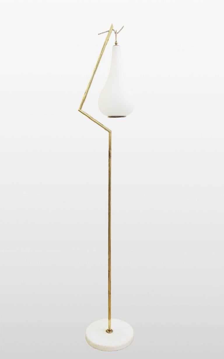 Brass floor lamp with white opaline drop glass.