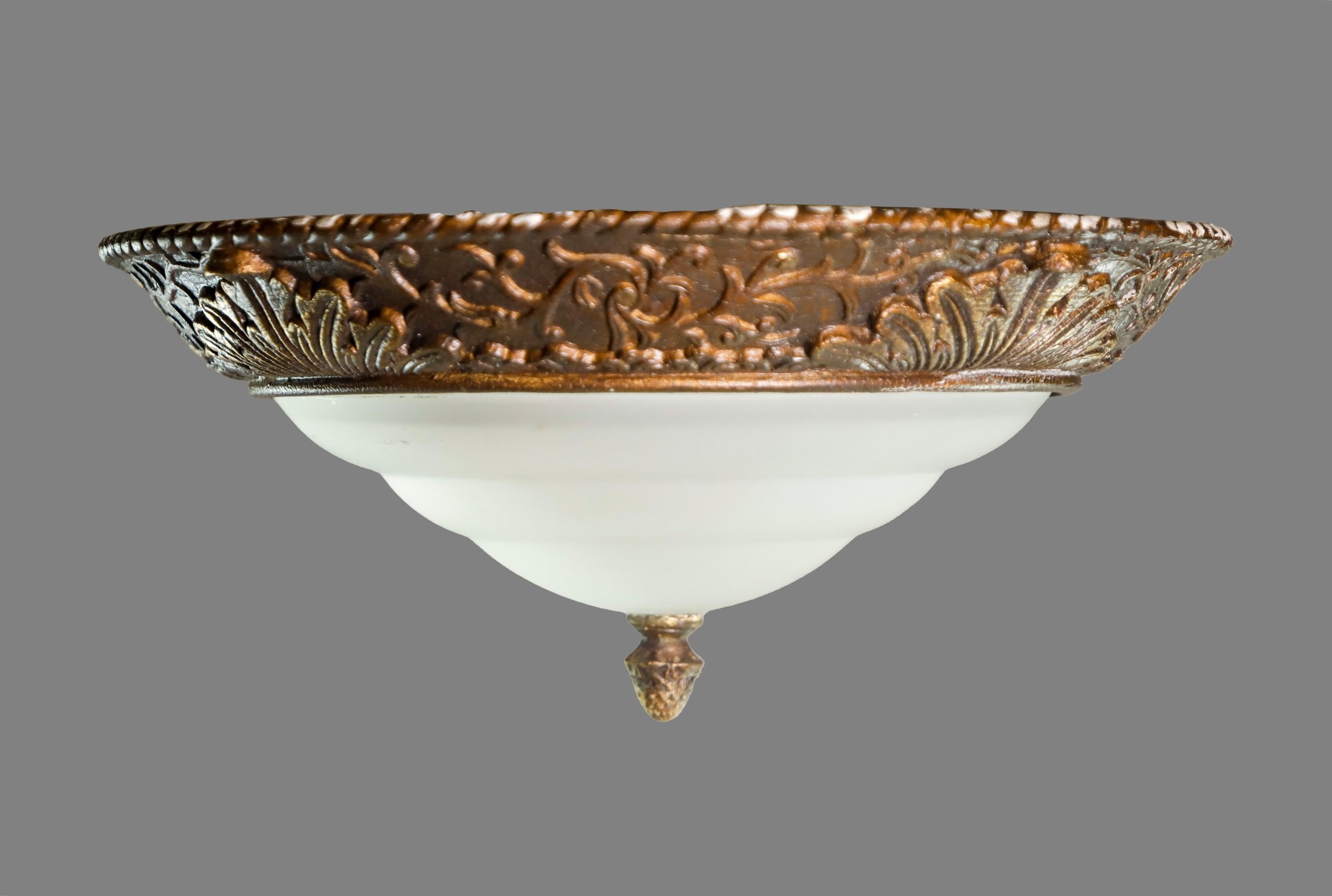 20th century Layered glass shade flush mount light with a floral design and acorn finial. Cleaned and restored. Please note, this item is located in our Scranton, PA location.