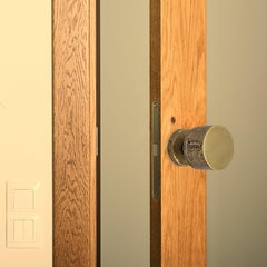 Solid brass door knob with cast texture: Minimalism and organic textures
