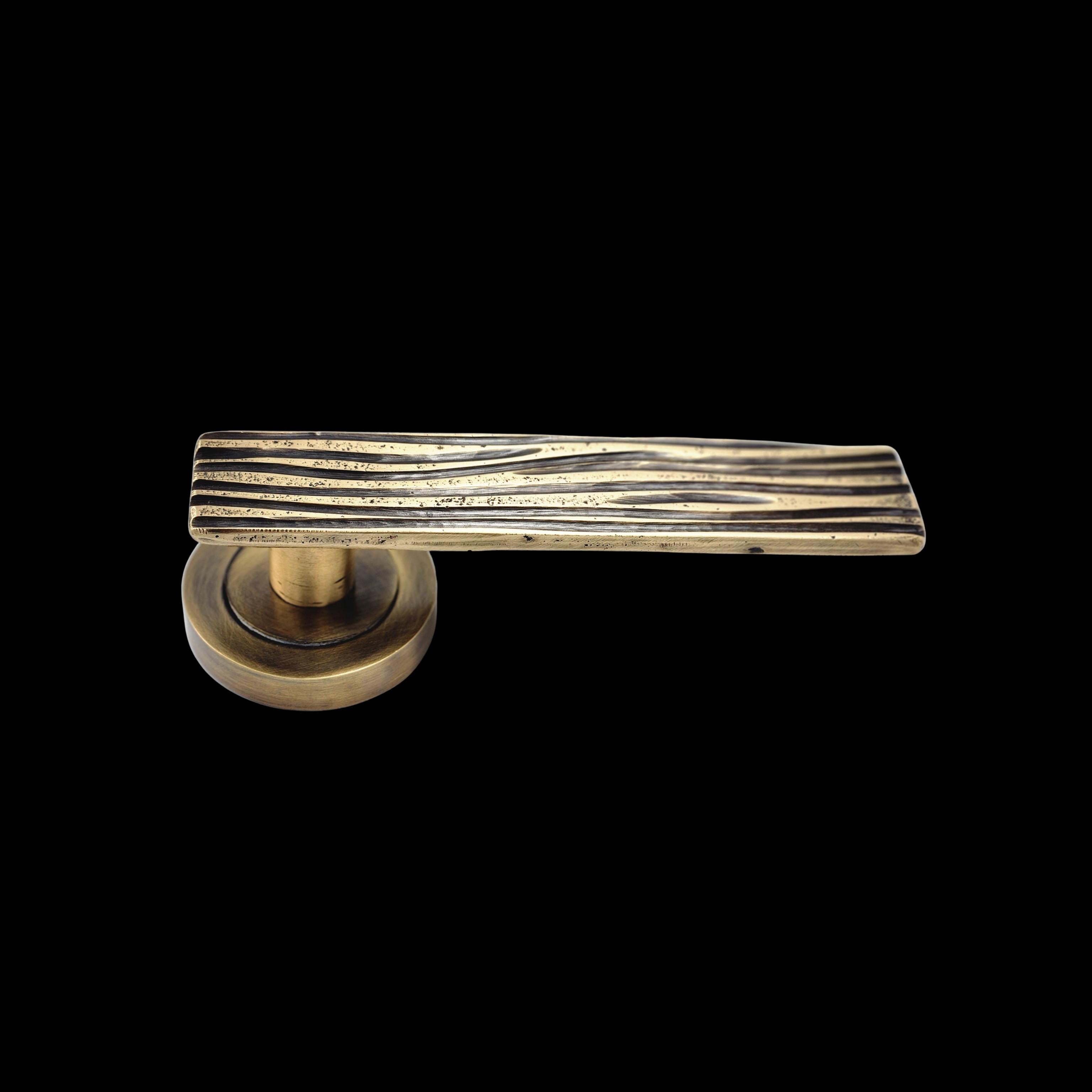 Organic Modern Solid brass lever handle with asymmetrical engravings For Sale
