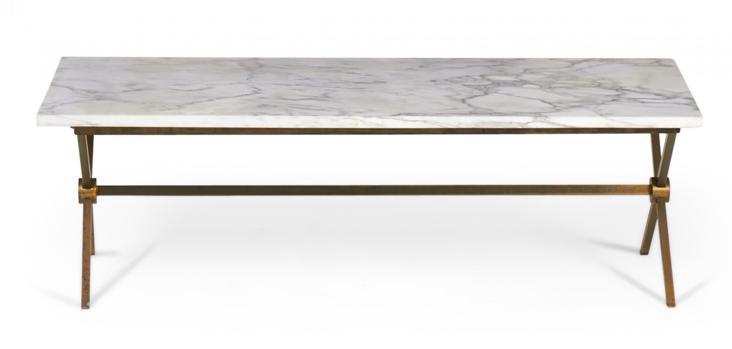 American mid-century rectangular coffee table with a brass x-shaped frame with stretcher supporting a white and gray Carrara marble table top. (manner of Maison Jansen).