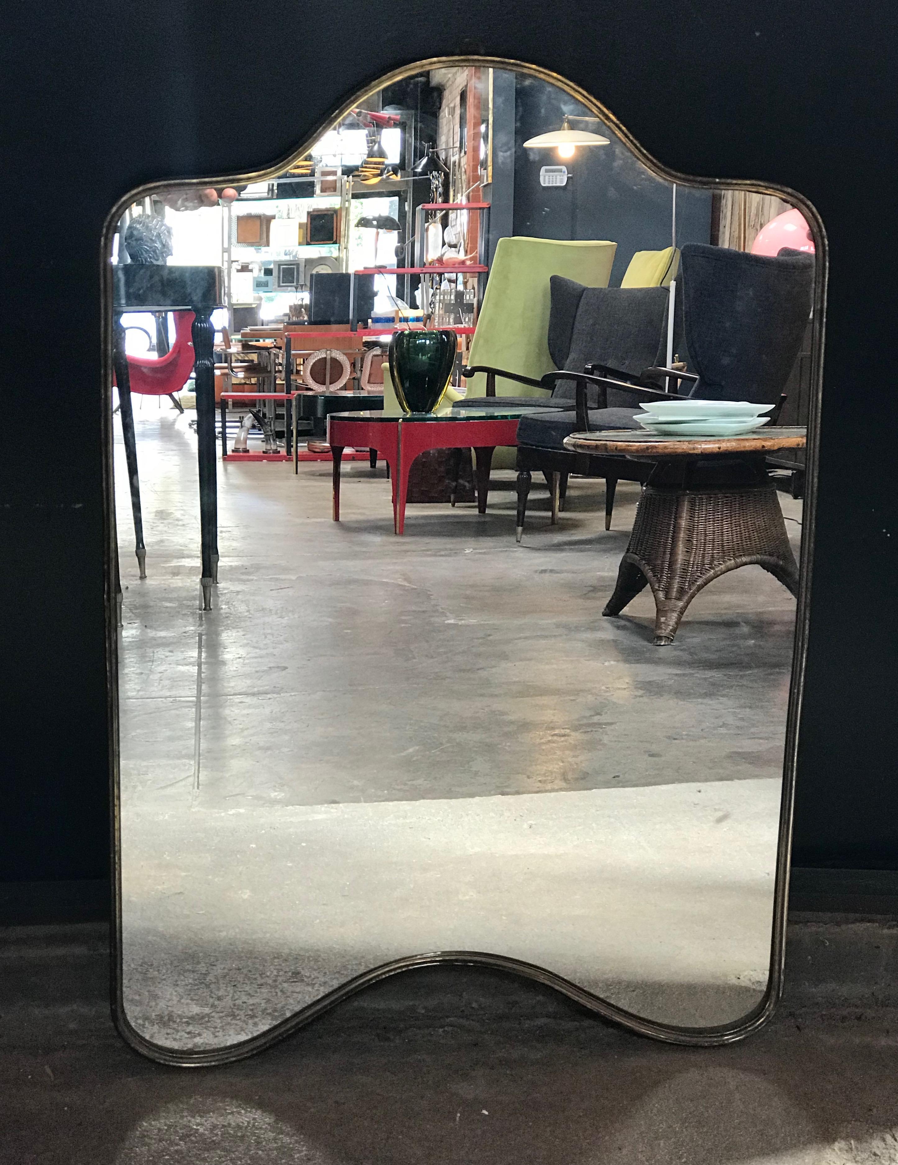 Brass frame Italian shield mirror, 1950s.