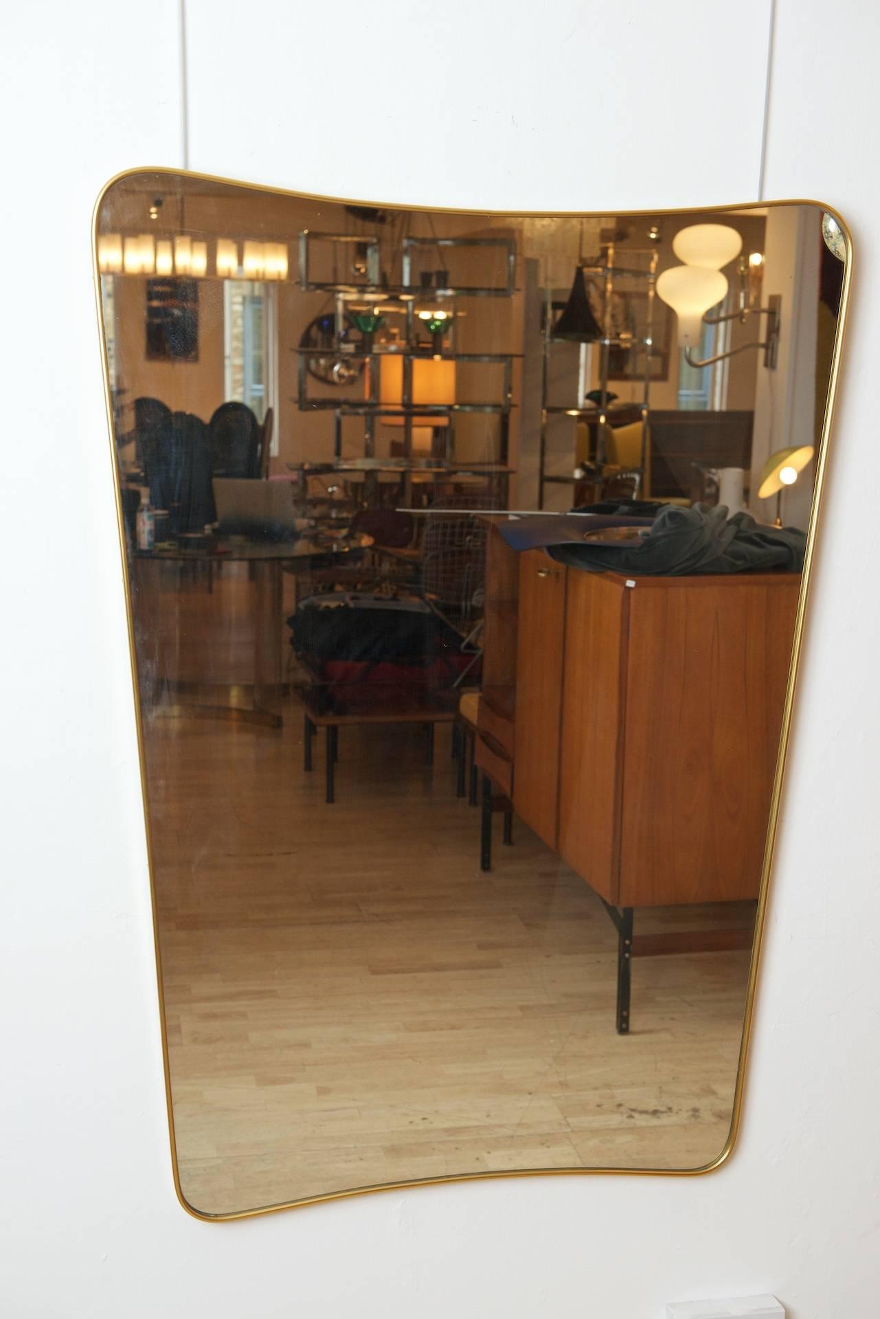 Italian brass framed mirror.